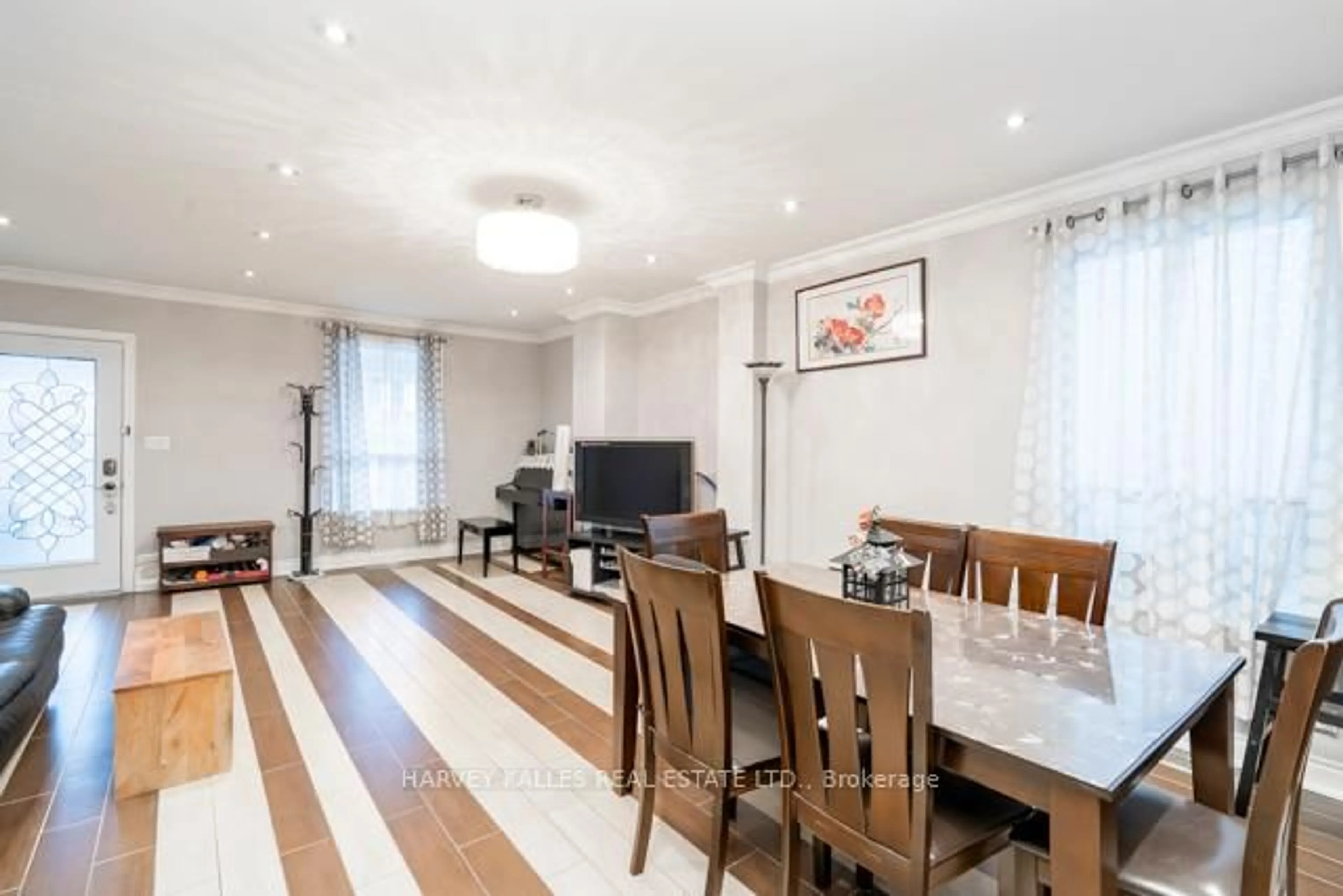 Dining room, wood/laminate floor for 132 Bellwoods Ave, Toronto Ontario M6J 2P4