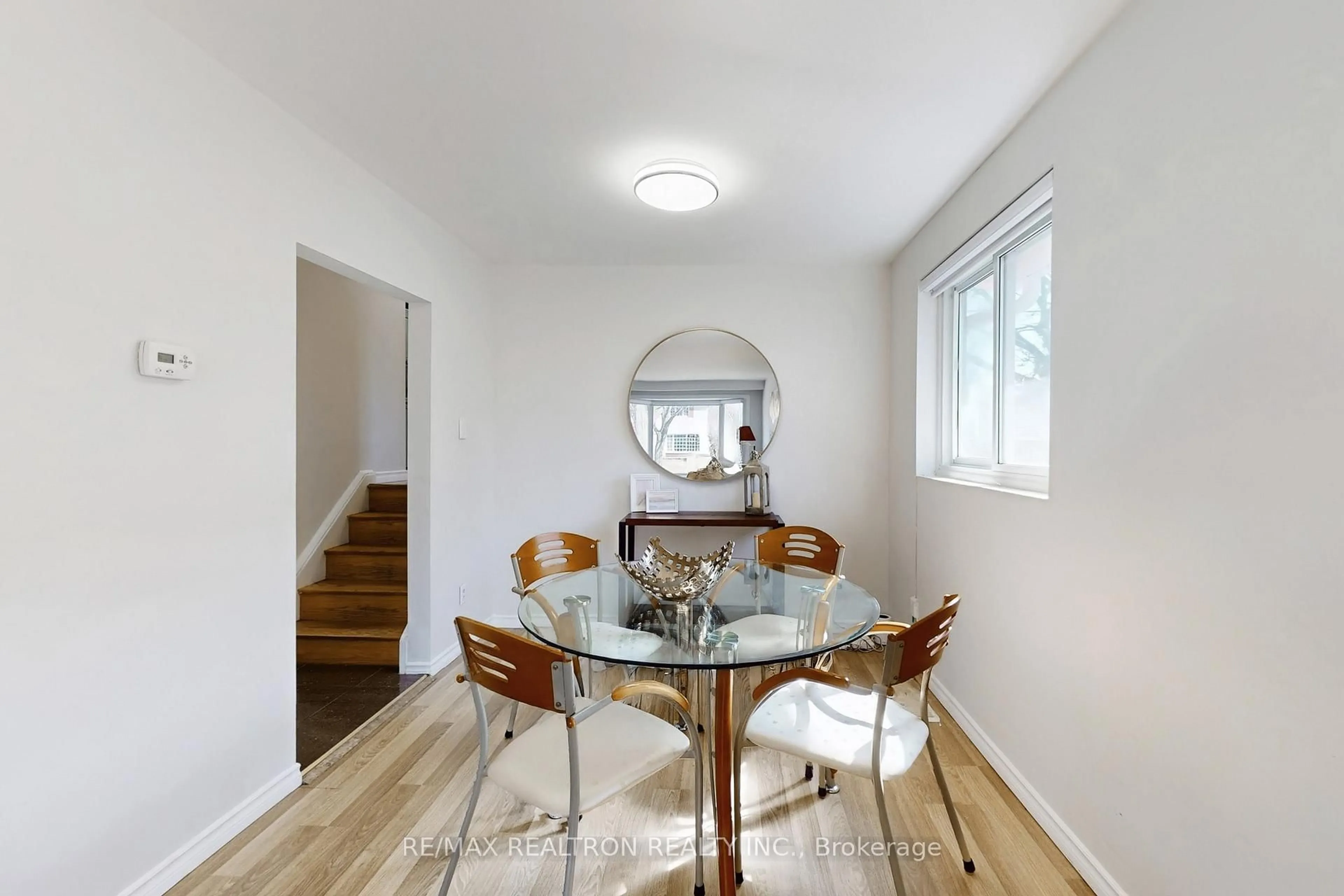 Dining room, wood/laminate floor for 23 Tristan Cres, Toronto Ontario M2H 1X2