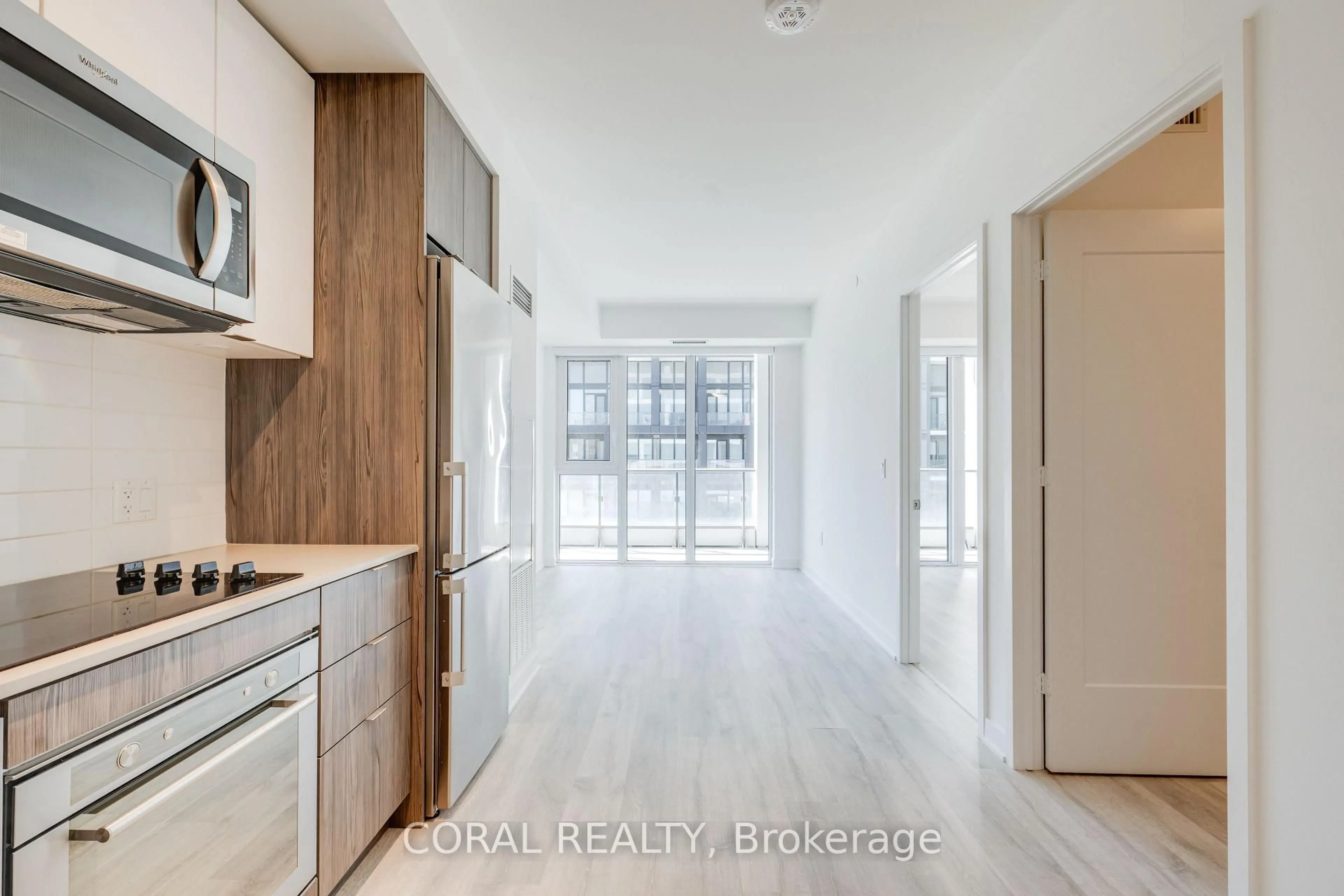 Open concept kitchen, wood/laminate floor for 60 PRINCESS St #347, Toronto Ontario M5A 2C7