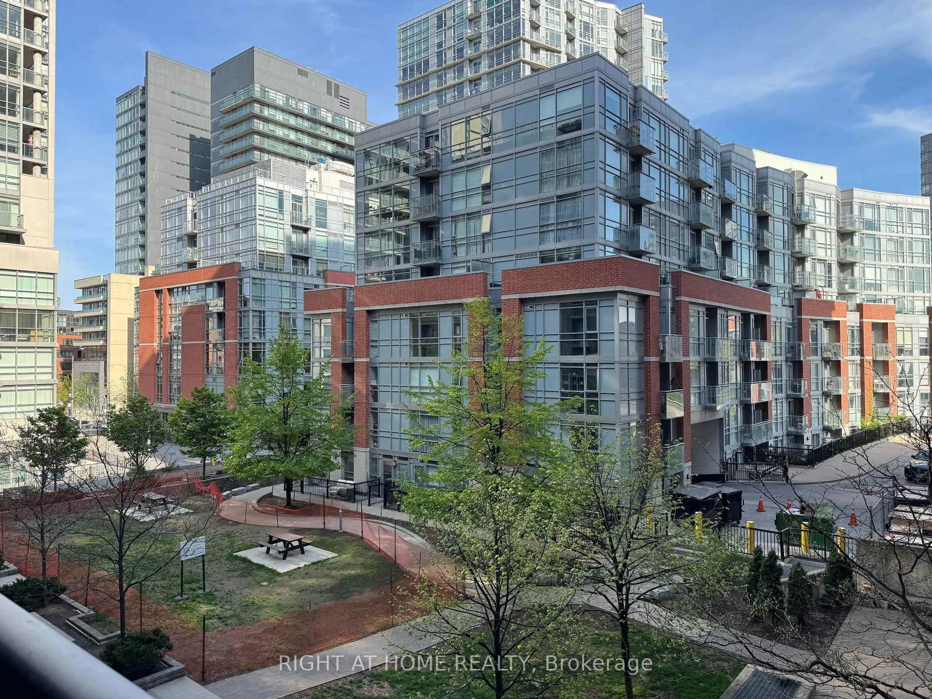 A pic from outside/outdoor area/front of a property/back of a property/a pic from drone, city buildings view from balcony for 68 Abell St #317, Toronto Ontario M6J 0B1