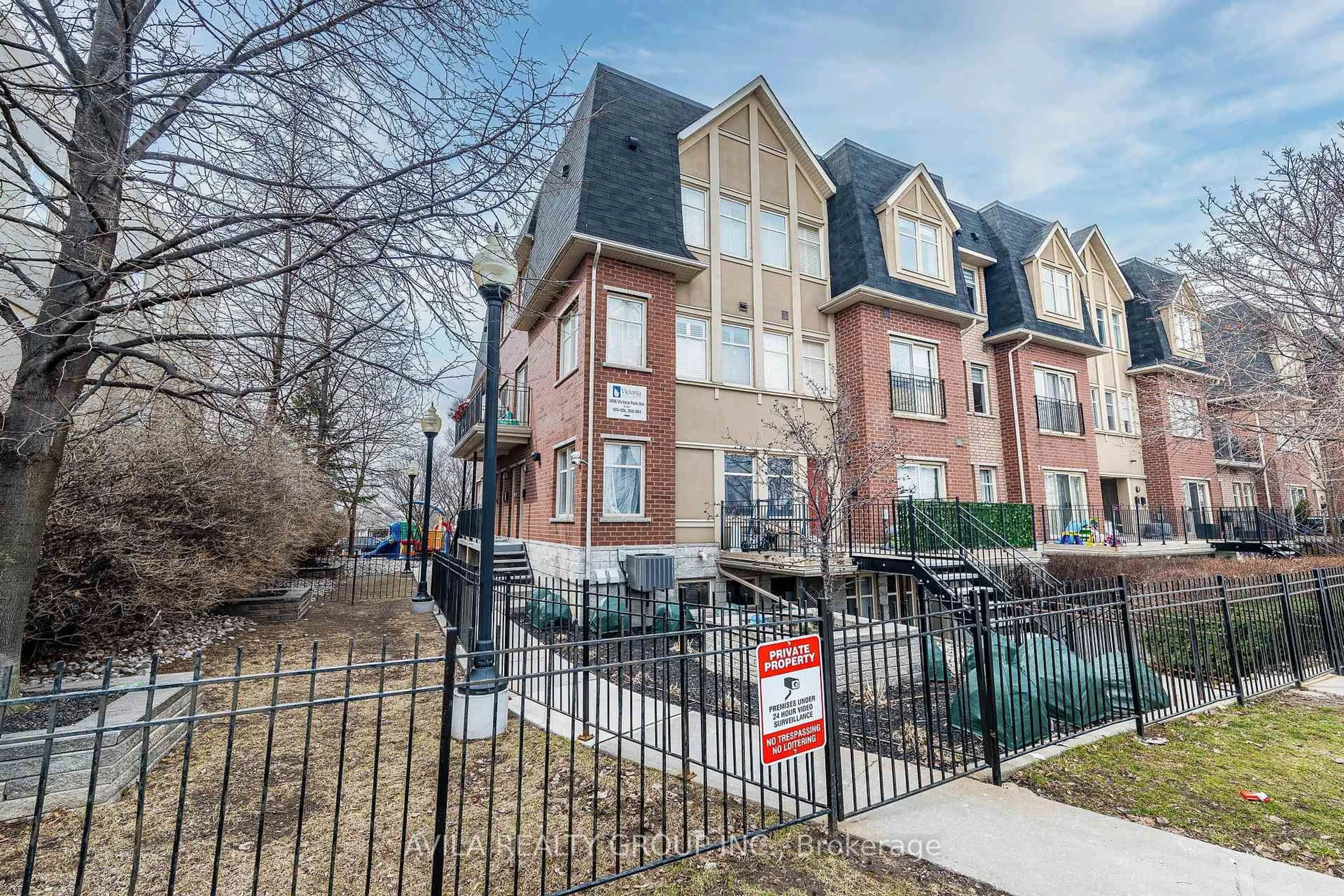Home with brick exterior material, street for 1496 Victoria Park Ave #254, Toronto Ontario M4A 2M6