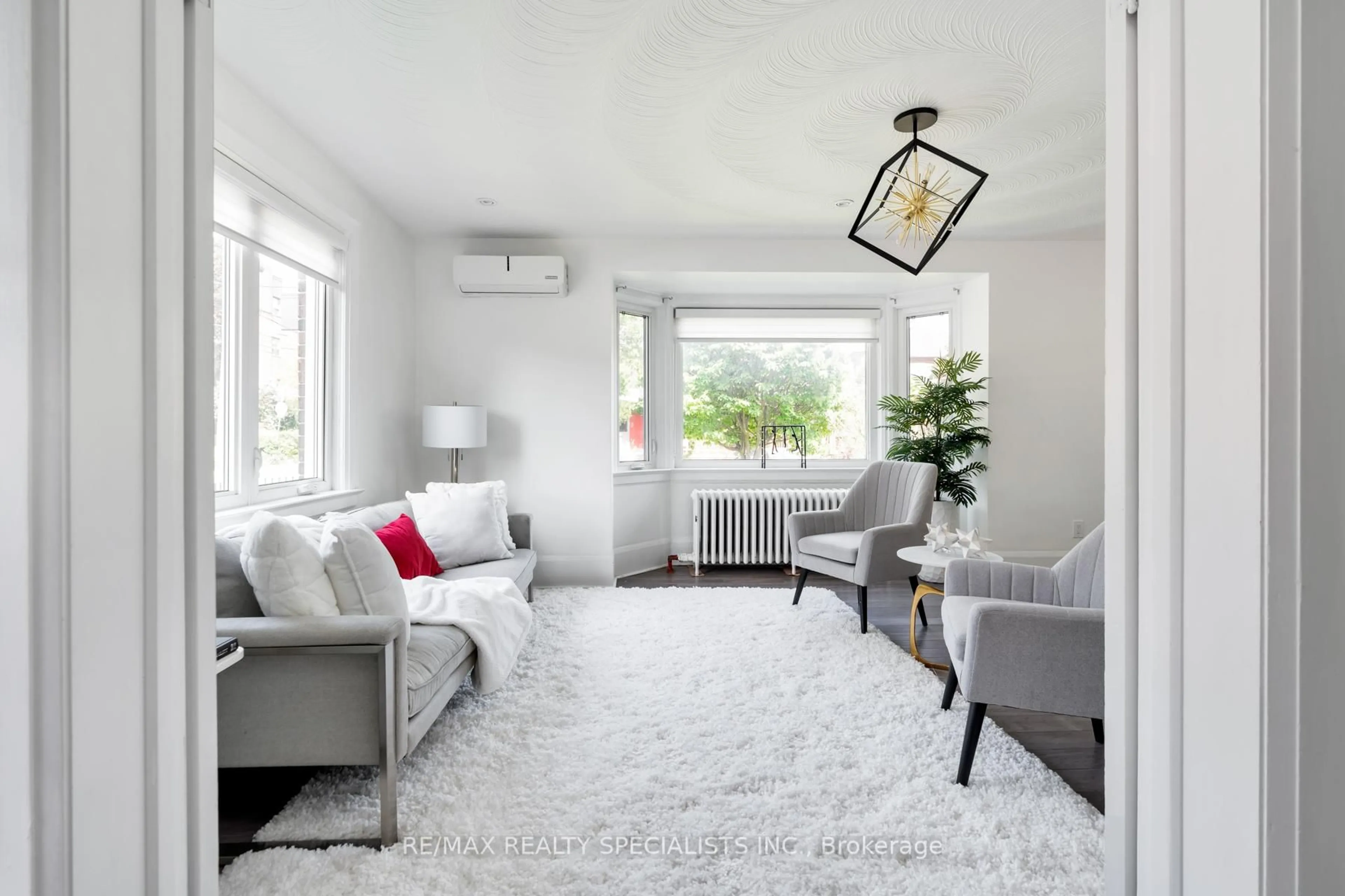 Living room with furniture, carpet floor for 290 Westmount Ave, Toronto Ontario M6E 3N1