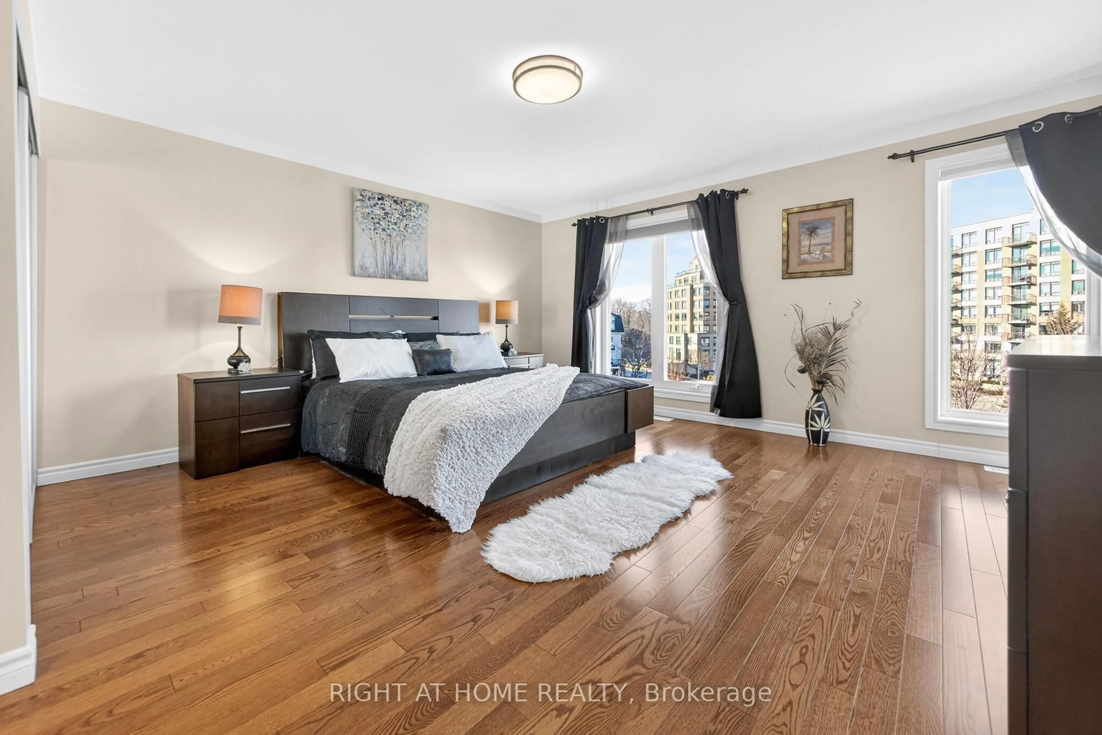 Bedroom with bed, wood/laminate floor for 254 David Dunlap Circ, Toronto Ontario M3C 4C1