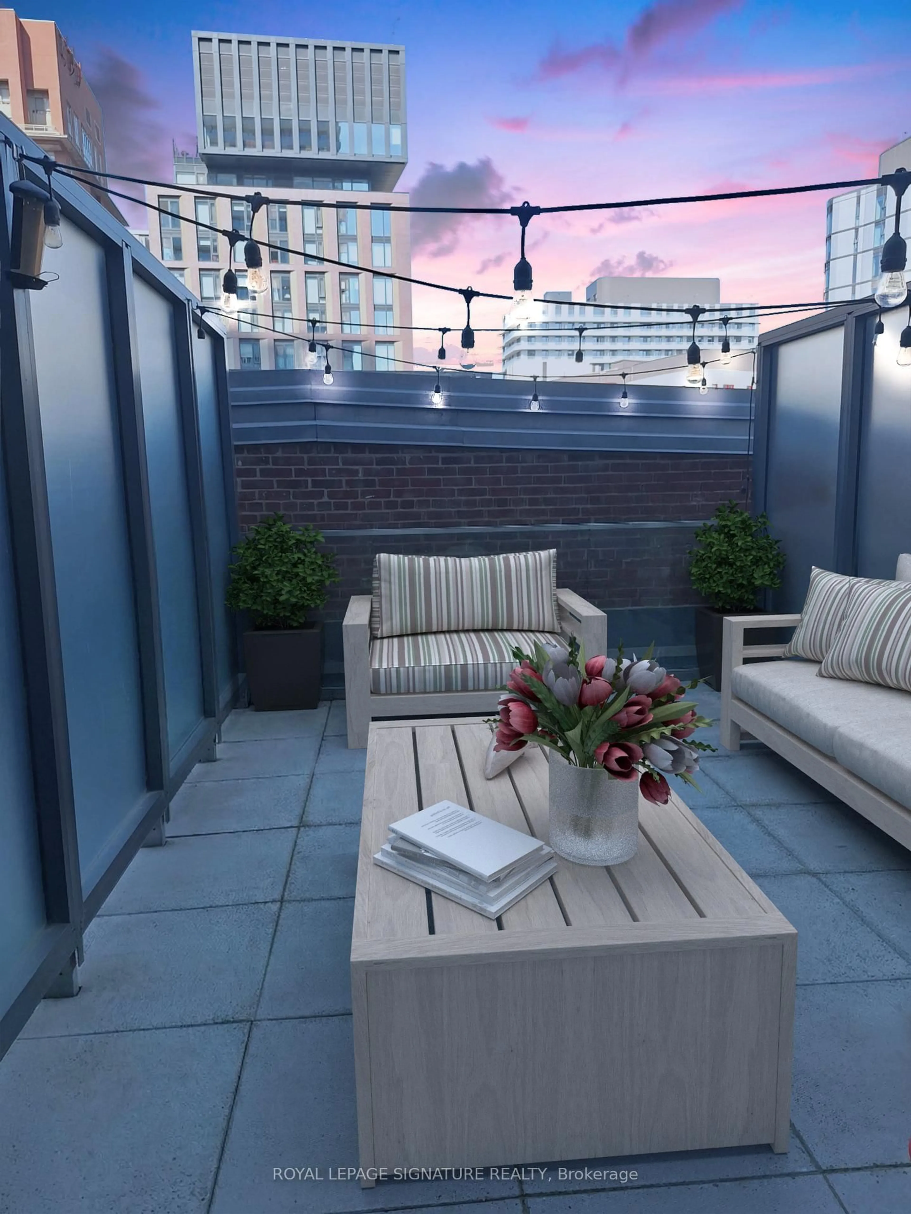 Patio, city buildings view from balcony for 390 Cherry St #204, Toronto Ontario M5A 0E2