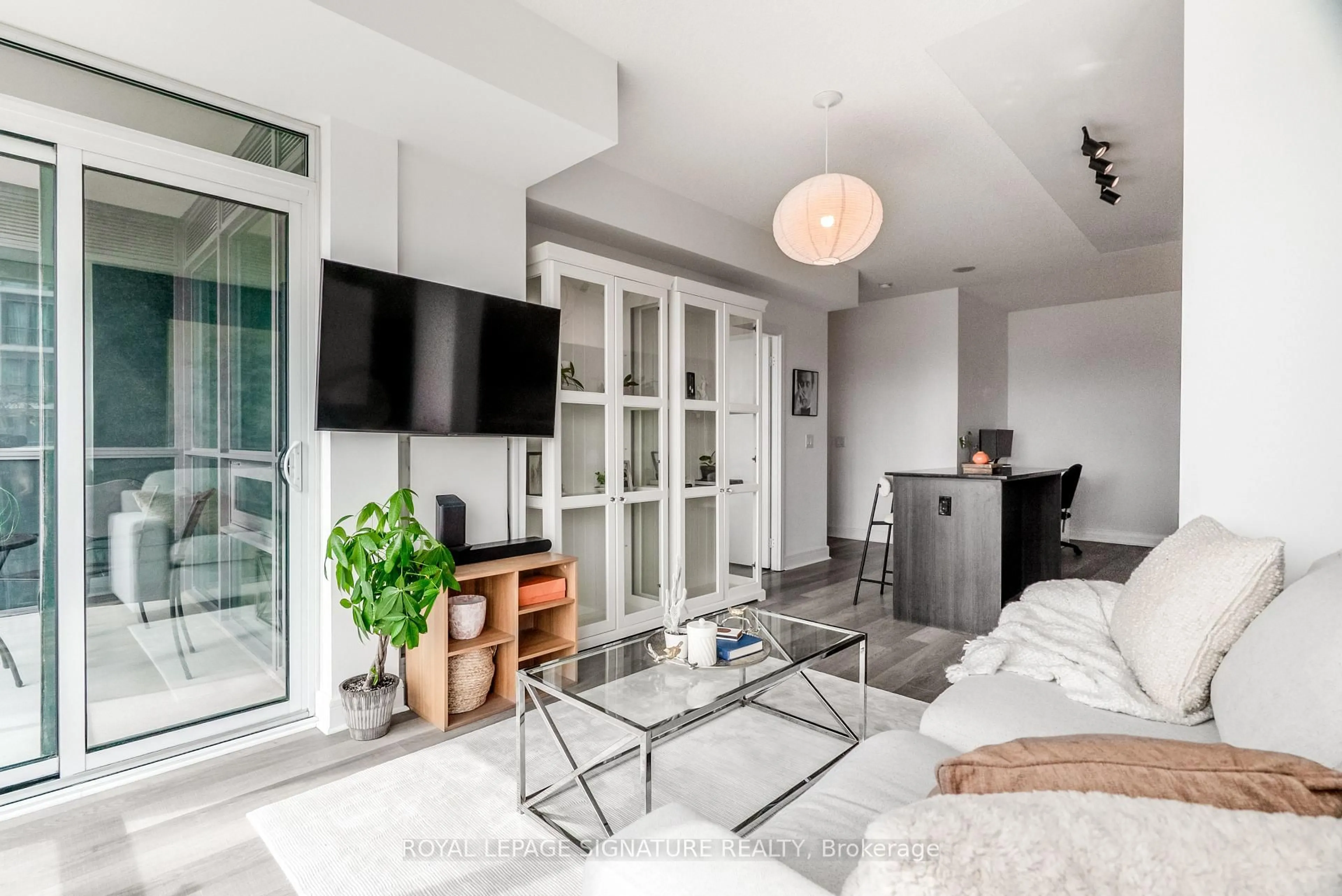 Living room with furniture, unknown for 35 Brian Peck Cres #515, Toronto Ontario M4G 0A5