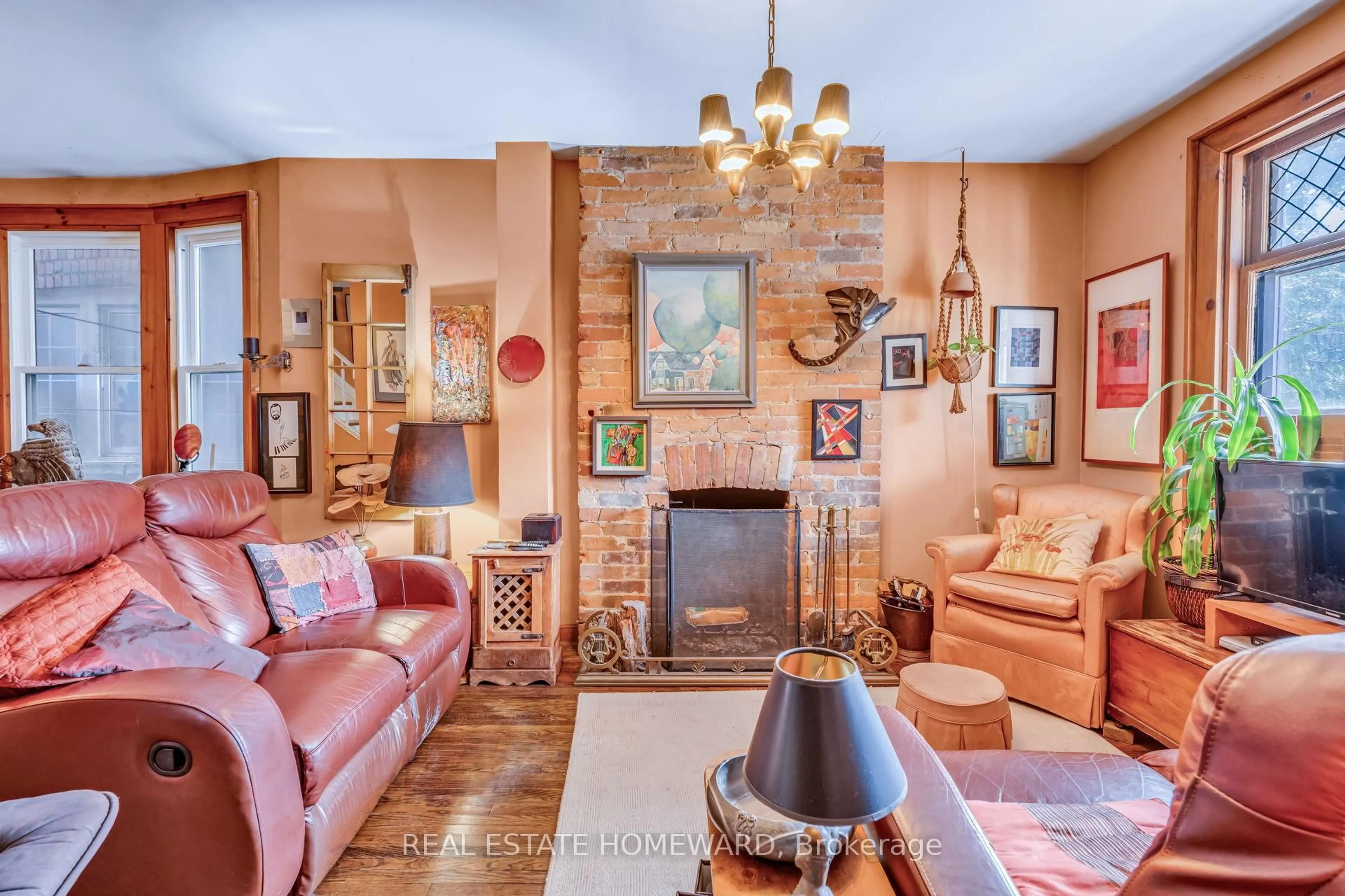 Living room with furniture, ceramic/tile floor for 97 Massey St, Toronto Ontario M6J 2T5