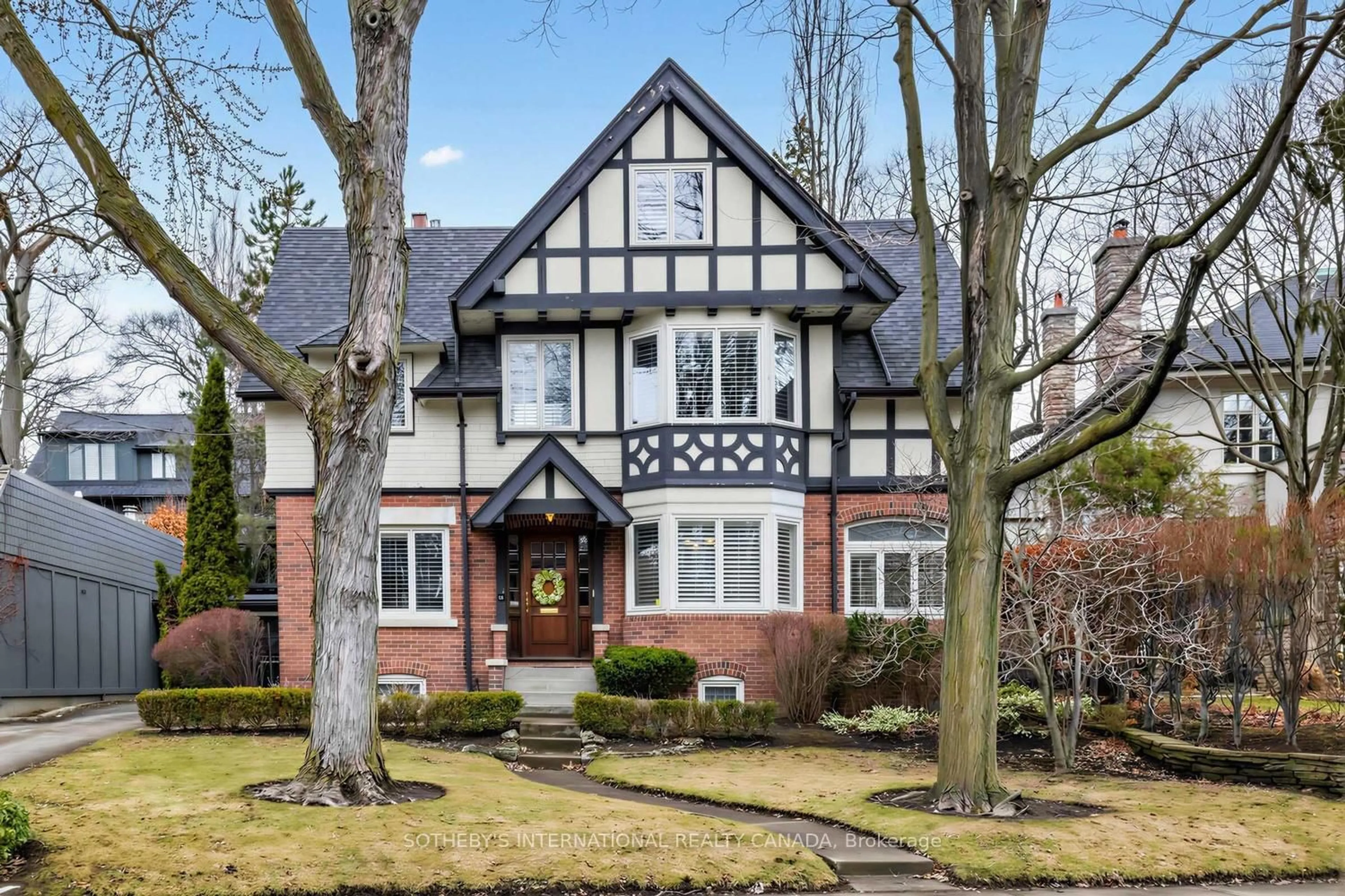 Home with brick exterior material, street for 136 Roxborough Dr, Toronto Ontario M4W 1X4