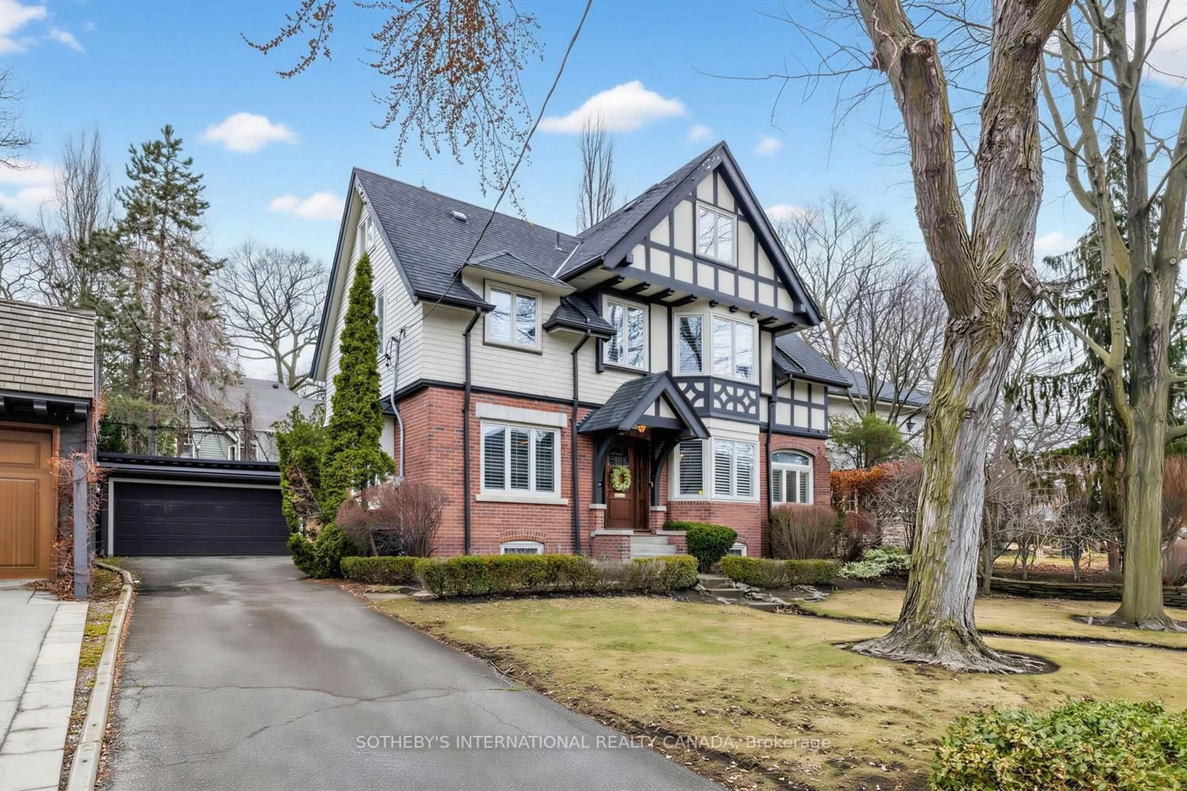 Home with brick exterior material, street for 136 Roxborough Dr, Toronto Ontario M4W 1X4