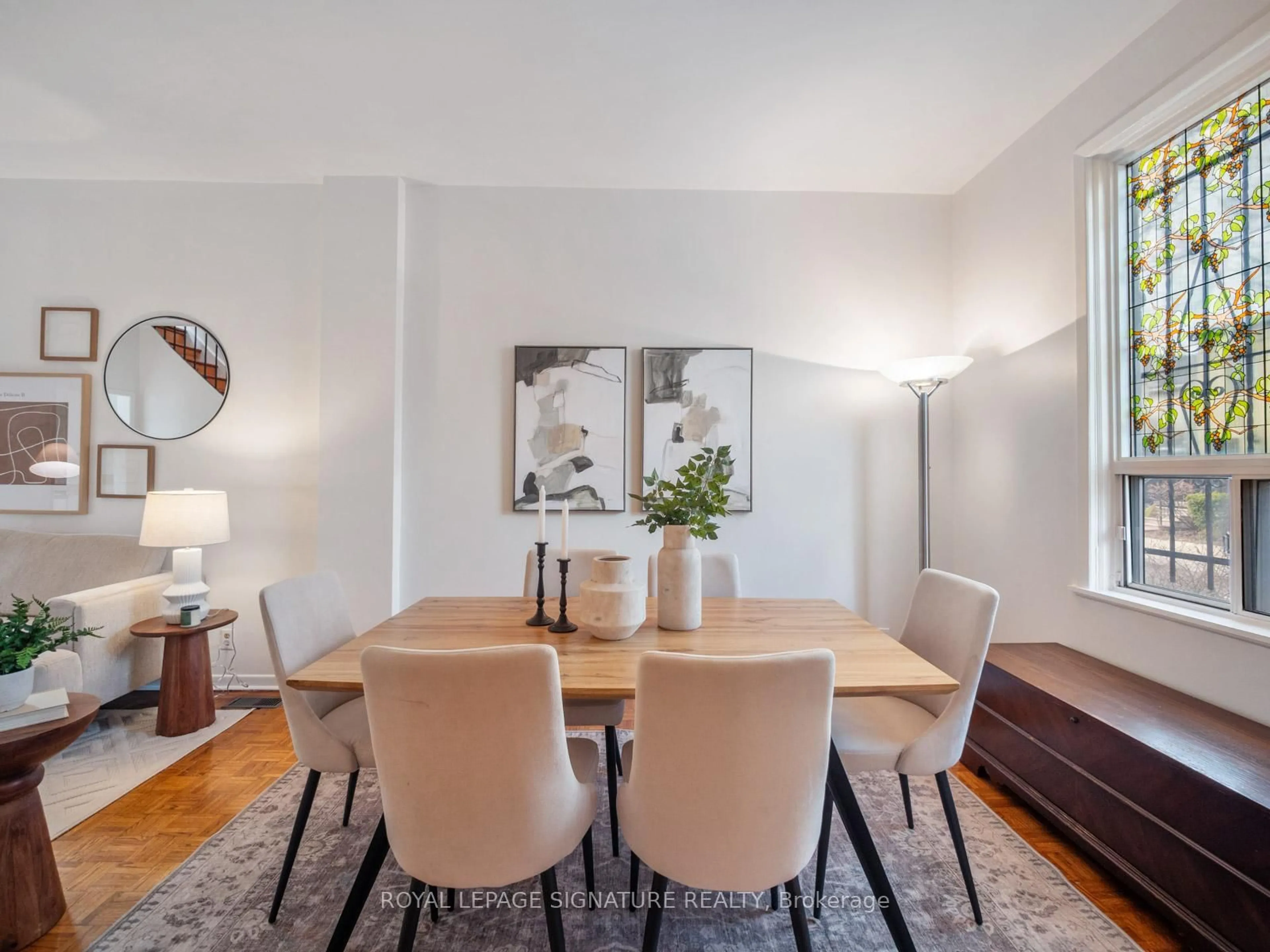 Dining room, wood/laminate floor for 487 Sackville St, Toronto Ontario M4X 1T6