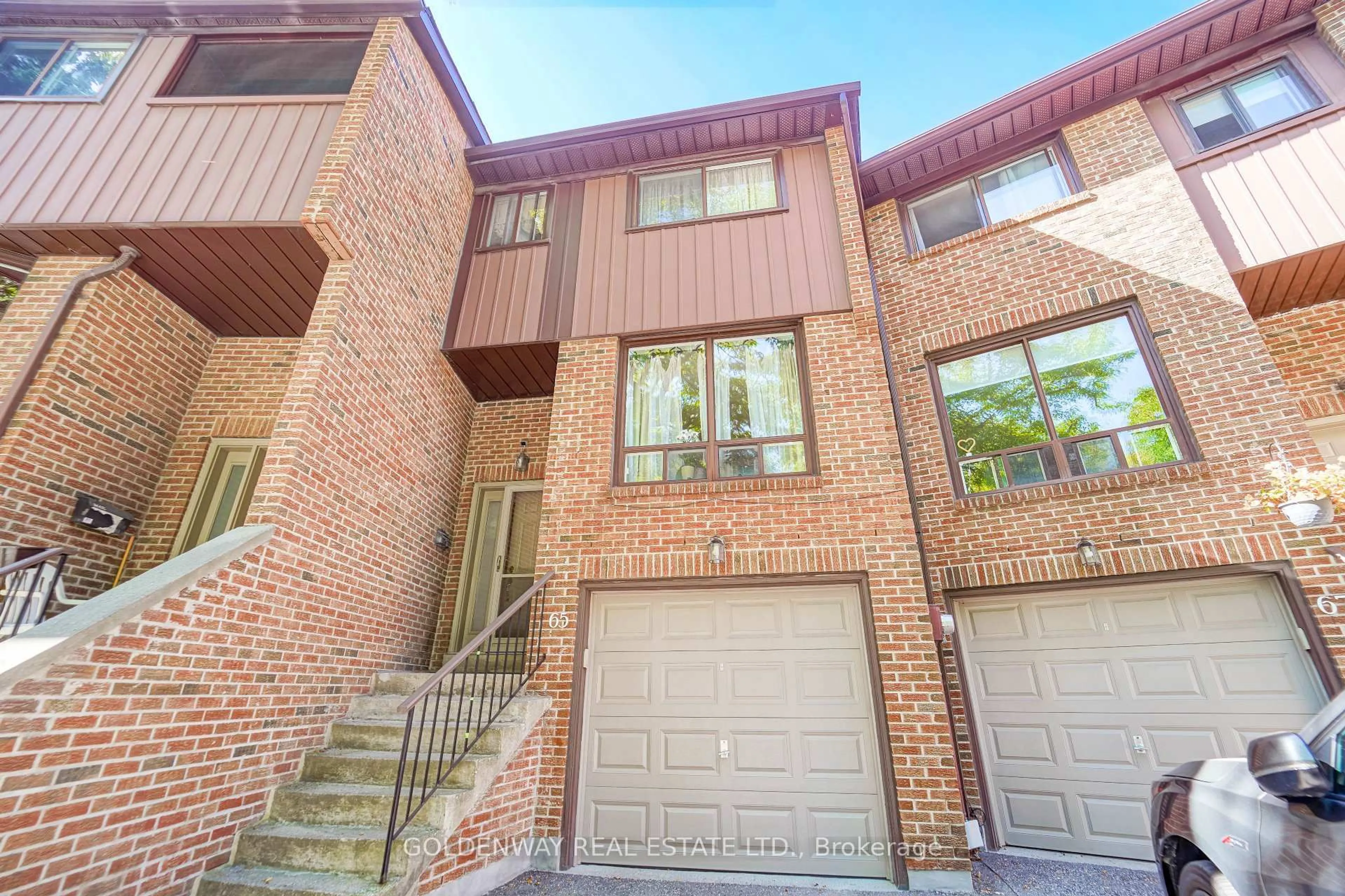 Home with brick exterior material, street for 65 Wagon Trailway, Toronto Ontario M2J 4V4