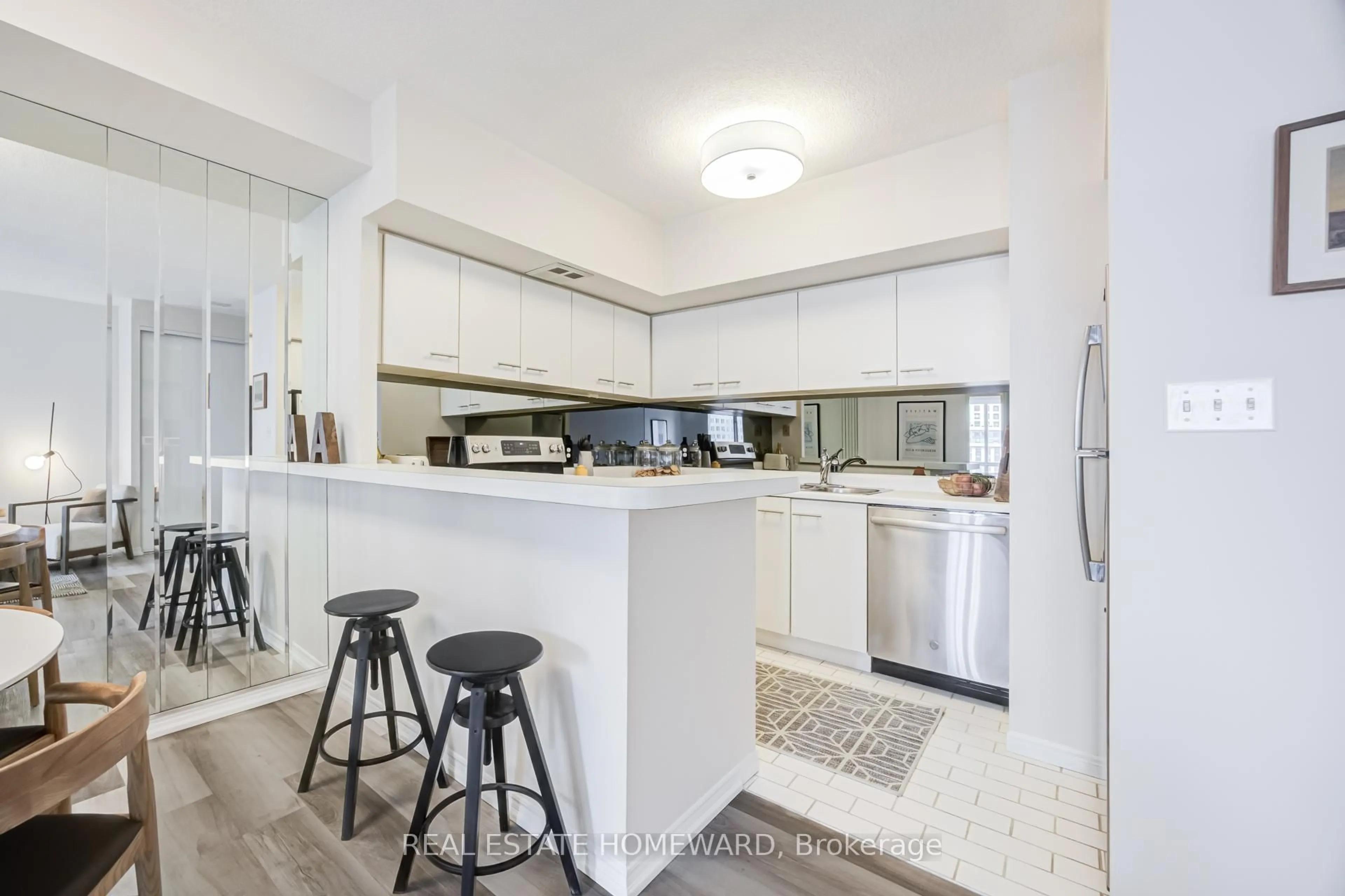 Open concept kitchen, ceramic/tile floor for 25 The Esplanade #1712, Toronto Ontario M5E 1W5