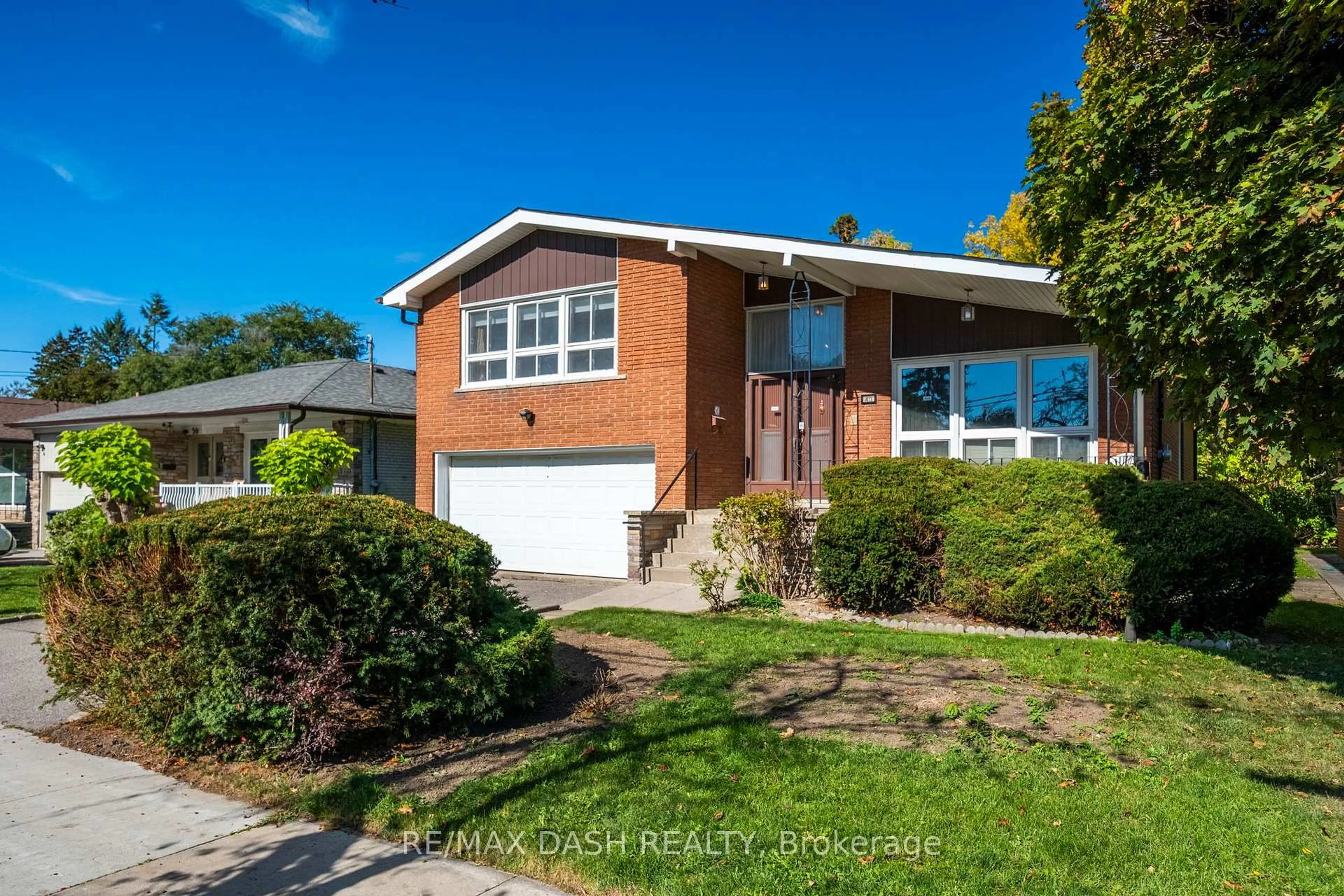 Home with brick exterior material, street for 48 Russfax Dr, Toronto Ontario M2R 3B1