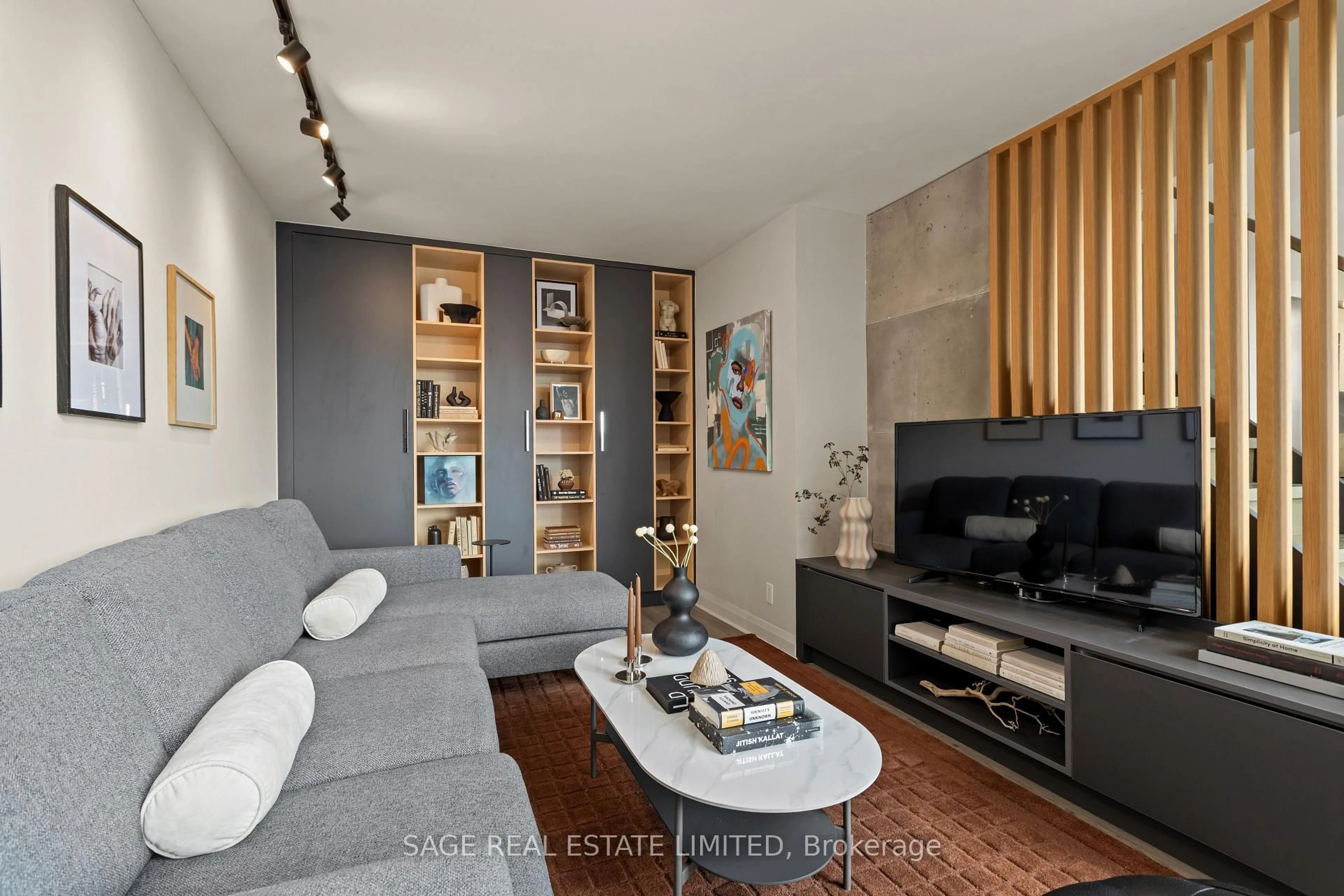 Living room with furniture, wood/laminate floor for 18 Merton St #506, Toronto Ontario M4S 3G9