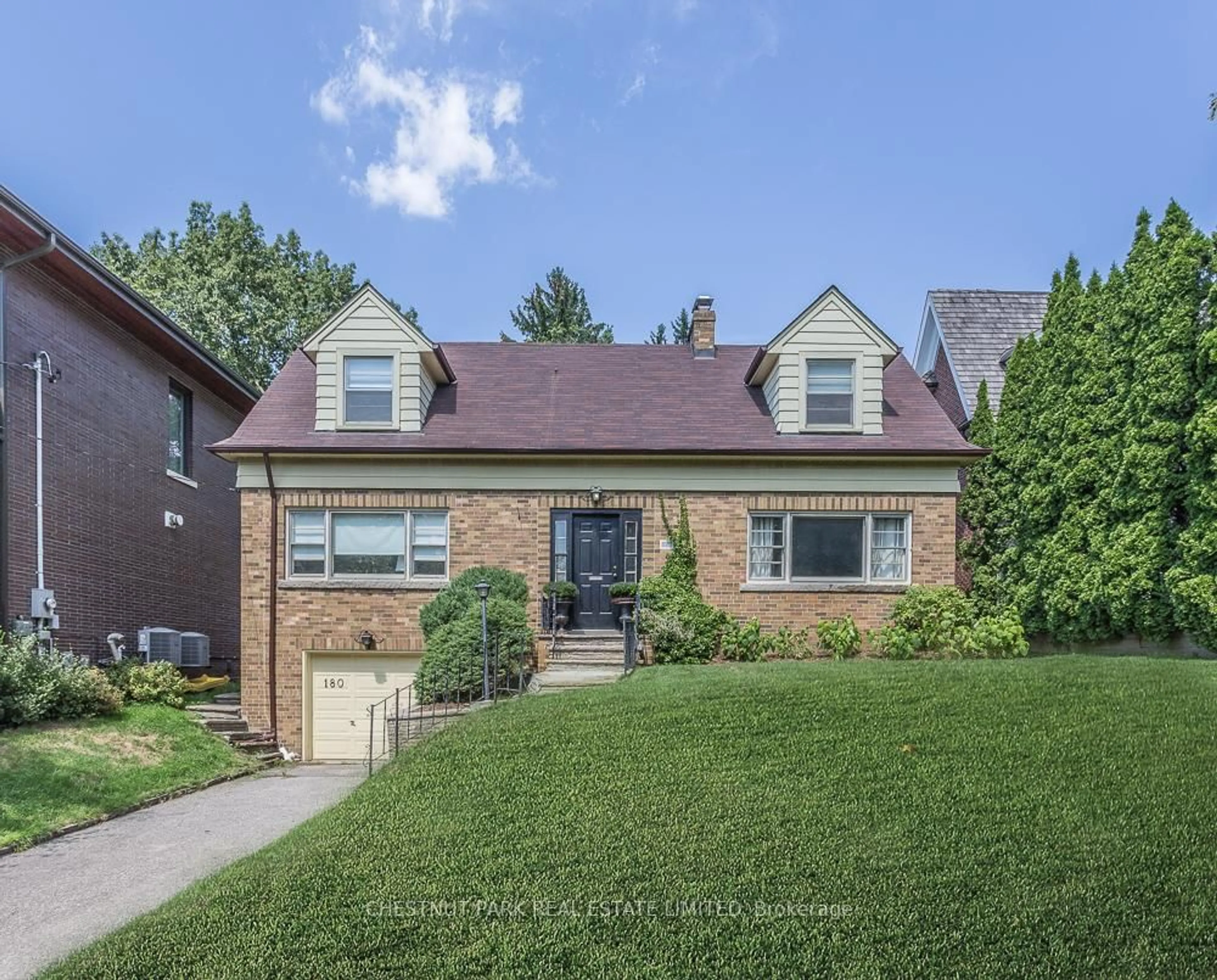 Home with brick exterior material, street for 180 Strathgowan Ave, Toronto Ontario M4N 1C3