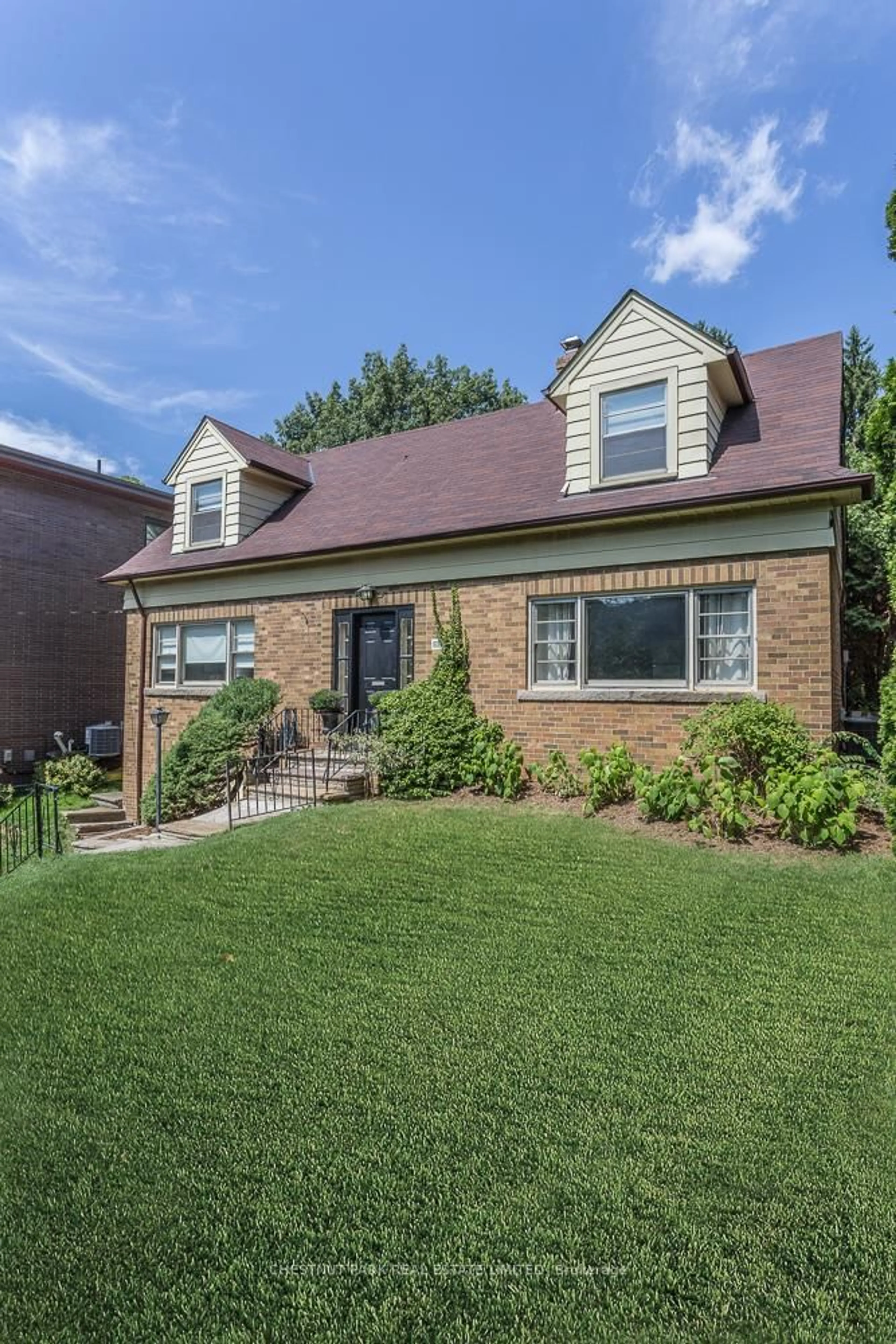 Home with brick exterior material, street for 180 Strathgowan Ave, Toronto Ontario M4N 1C3