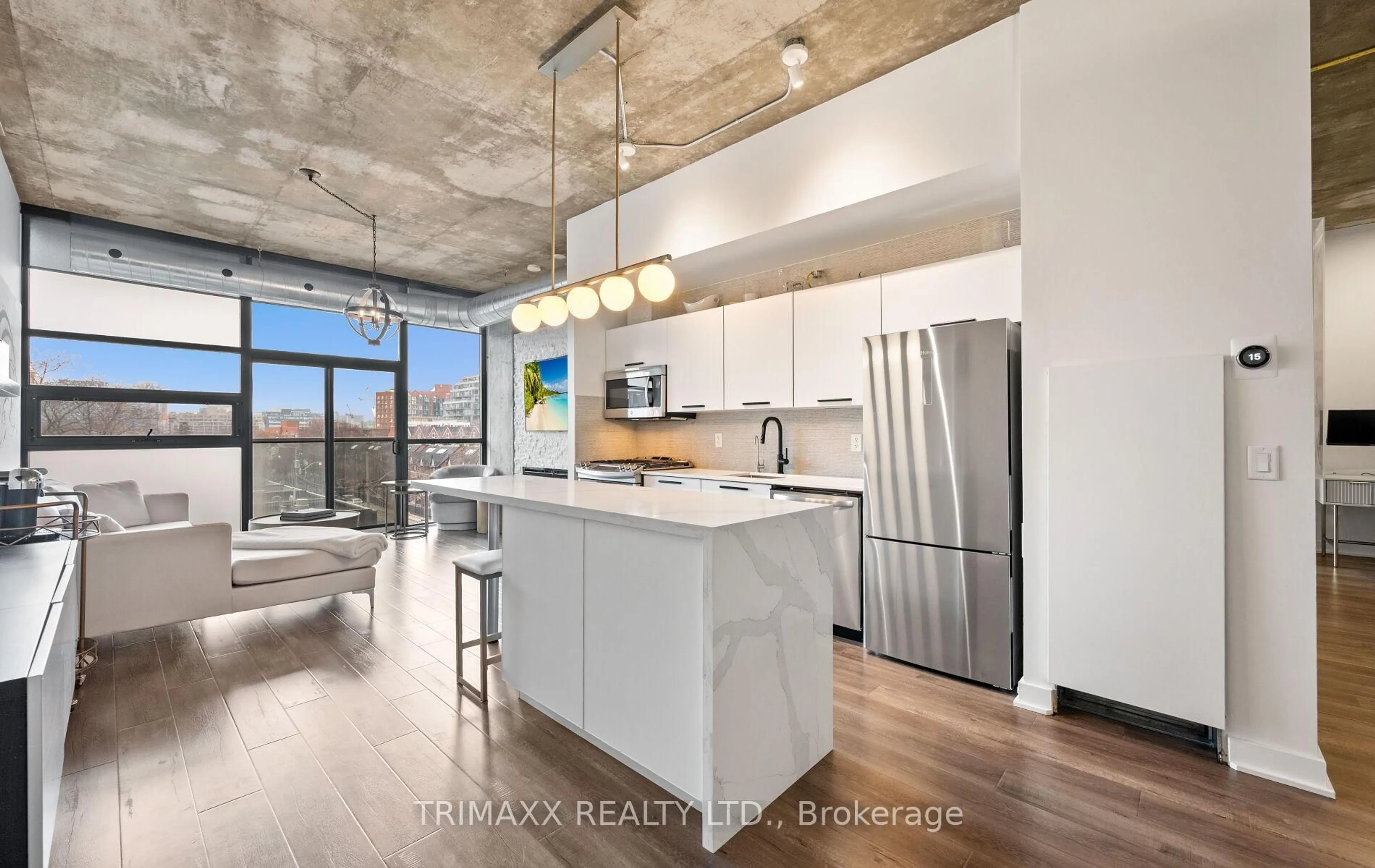 Open concept kitchen, cement floor for 60 Bathurst St #403, Toronto Ontario M5V 2P4