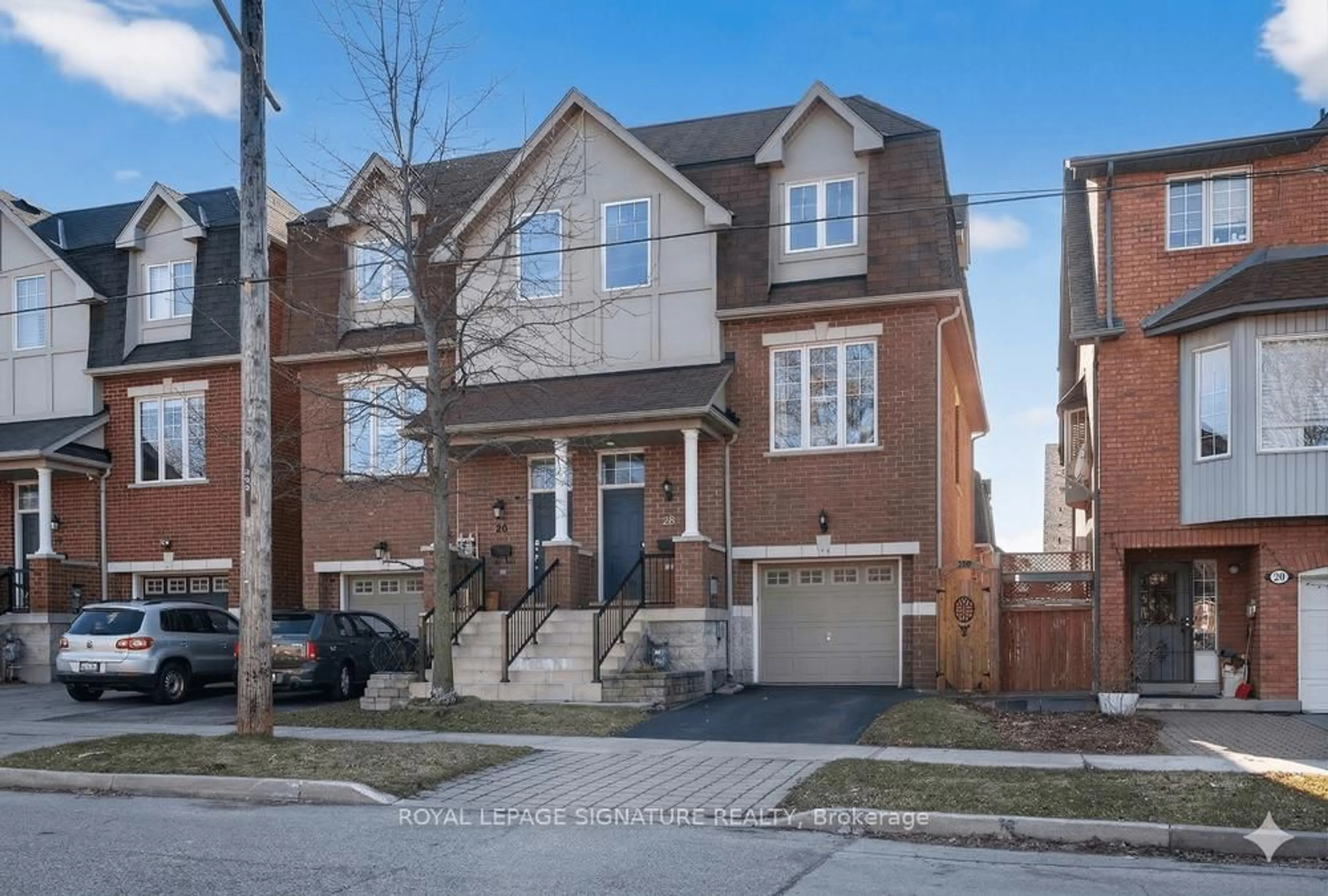 Home with brick exterior material, street for 28 Tisdale Ave, Toronto Ontario M4A 1Y5