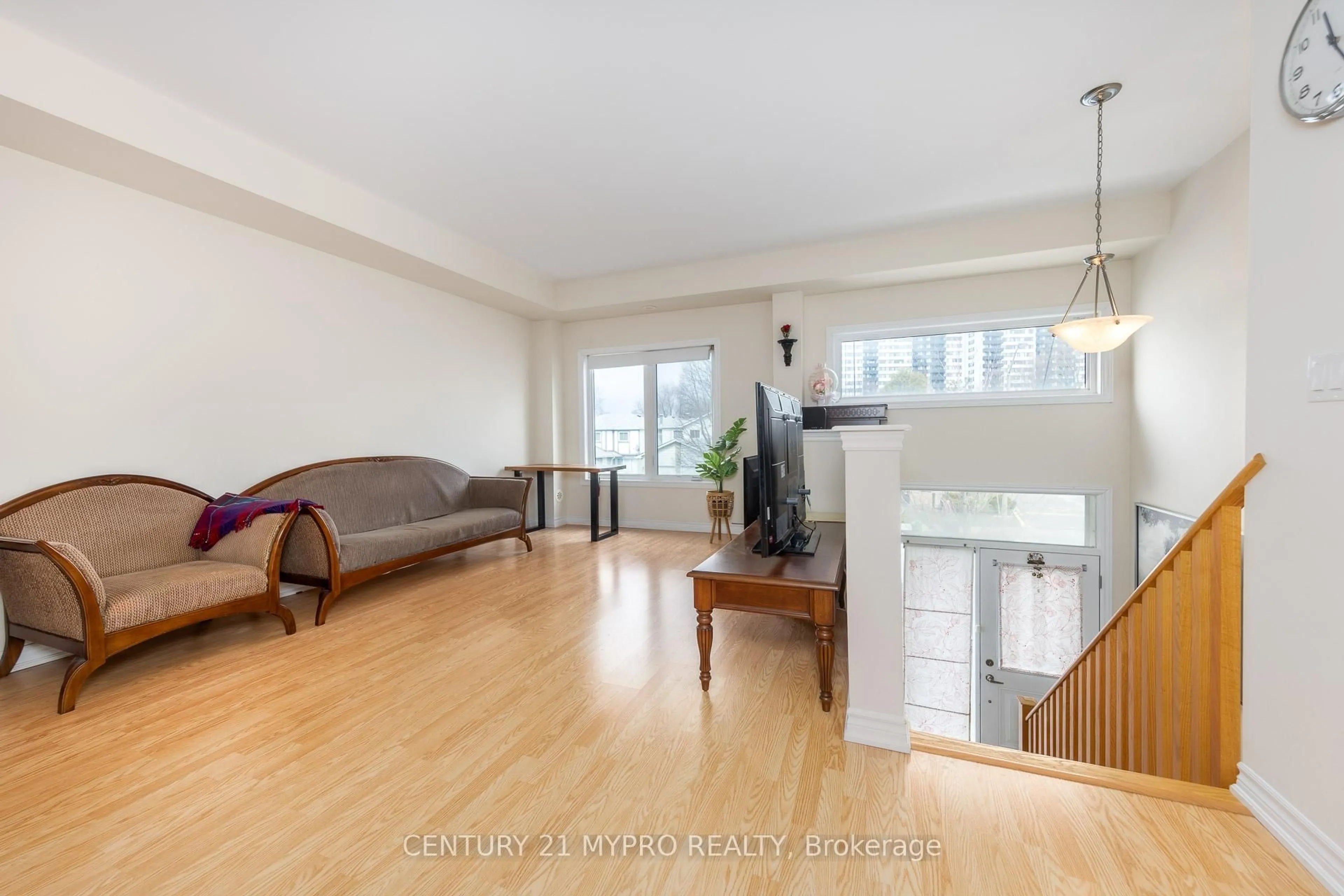 Living room with furniture, wood/laminate floor for 69 Antibes Dr, Toronto Ontario M2R 2Y9