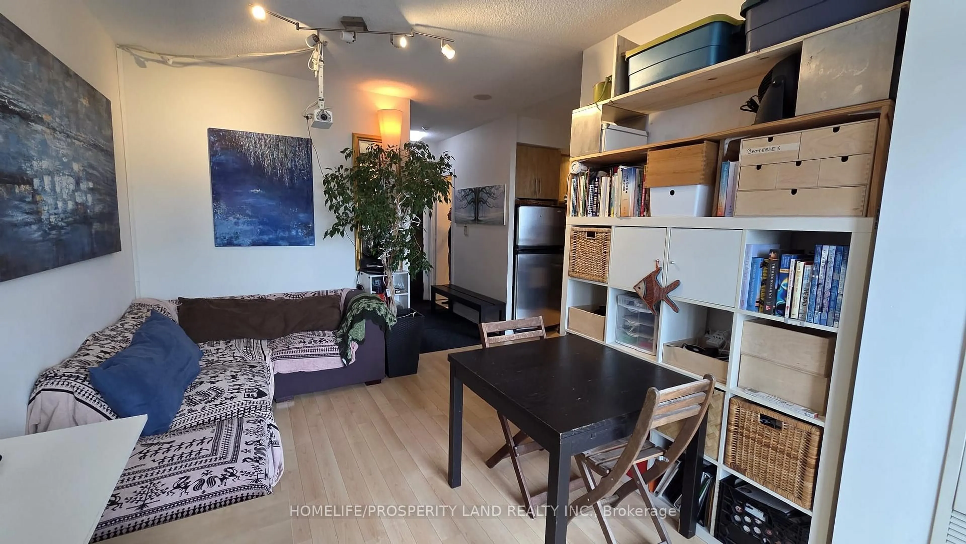 Living room with furniture, wood/laminate floor for 120 Homewood Ave #1706, Toronto Ontario M4Y 2J3