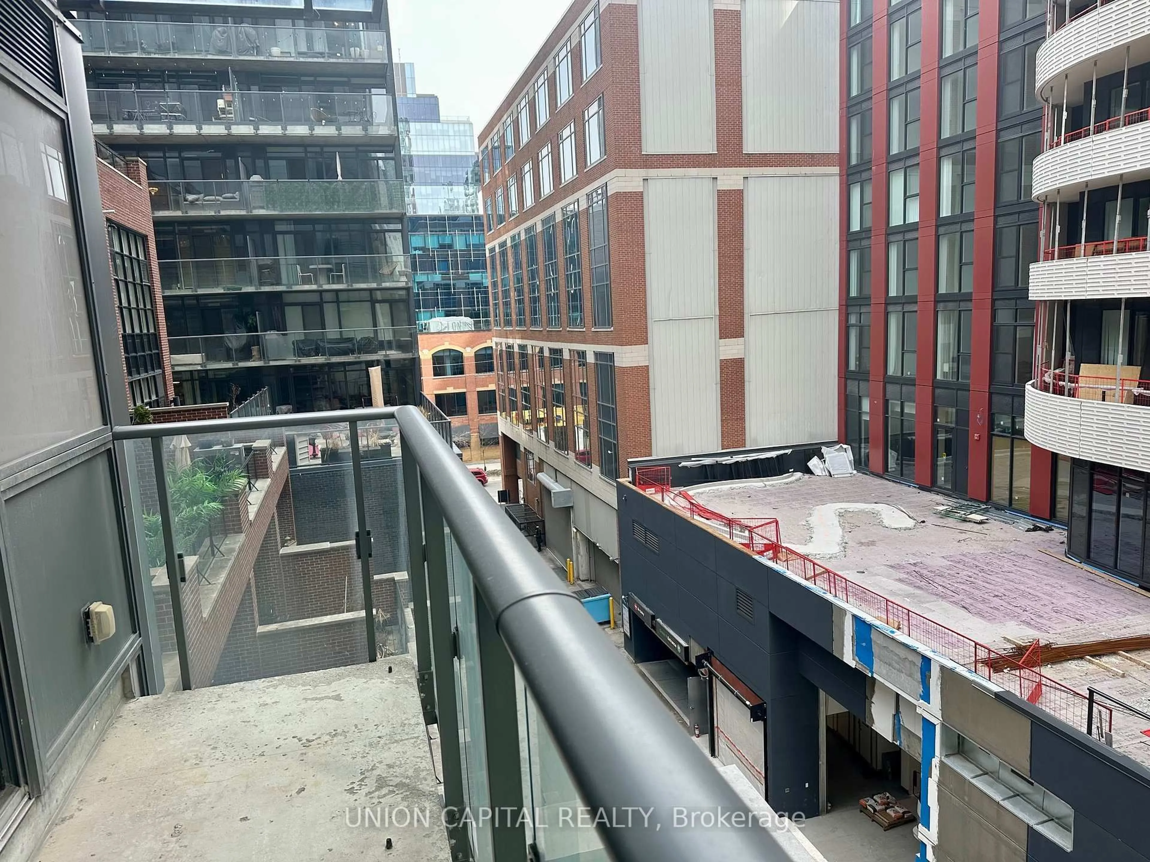 Balcony in the apartment, city buildings view from balcony for 39 Sherbourne St #501, Toronto Ontario M5A 0L8