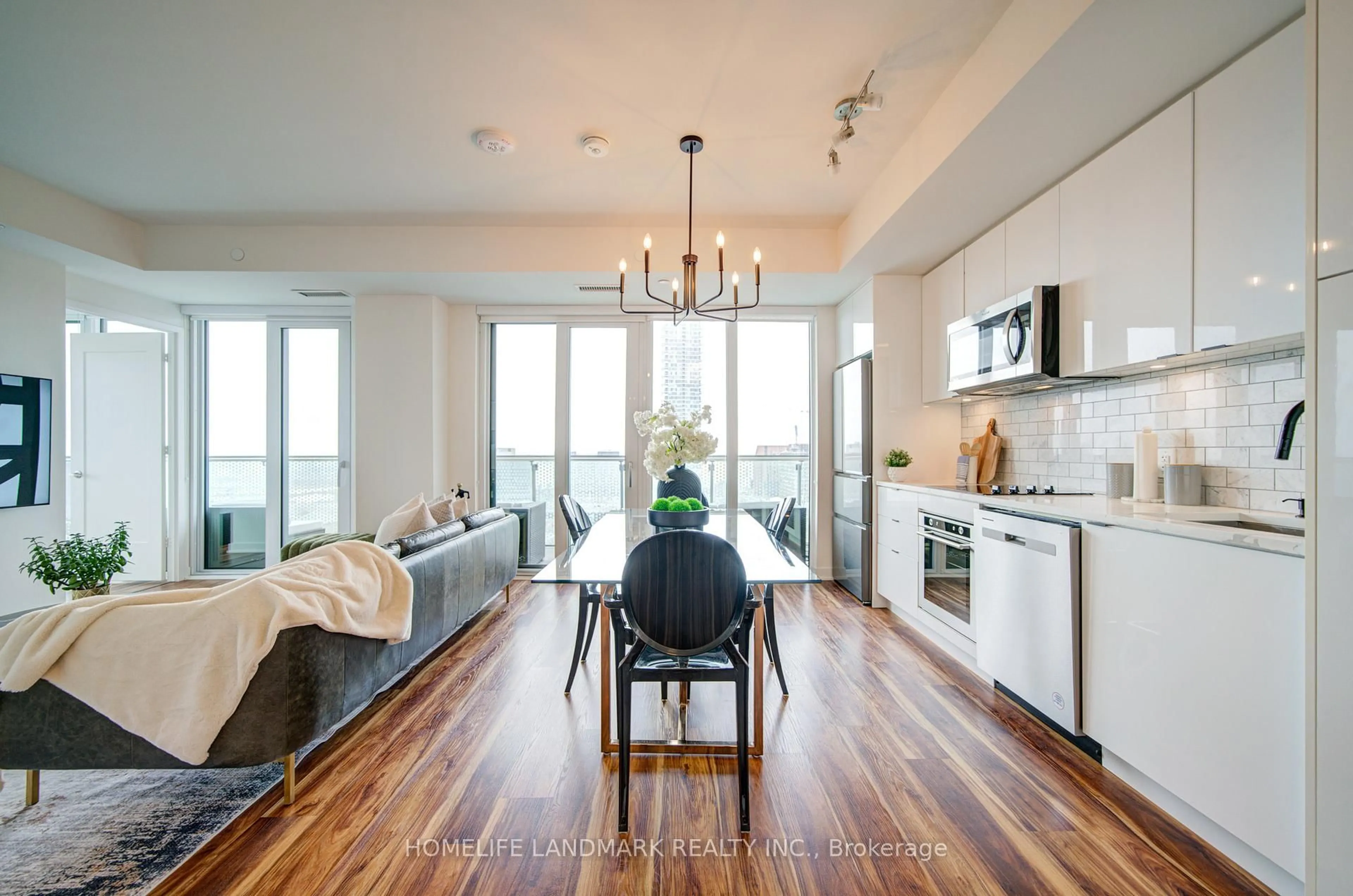 Open concept kitchen, wood/laminate floor for 60 Princess St #1419, Toronto Ontario M5A 2C7