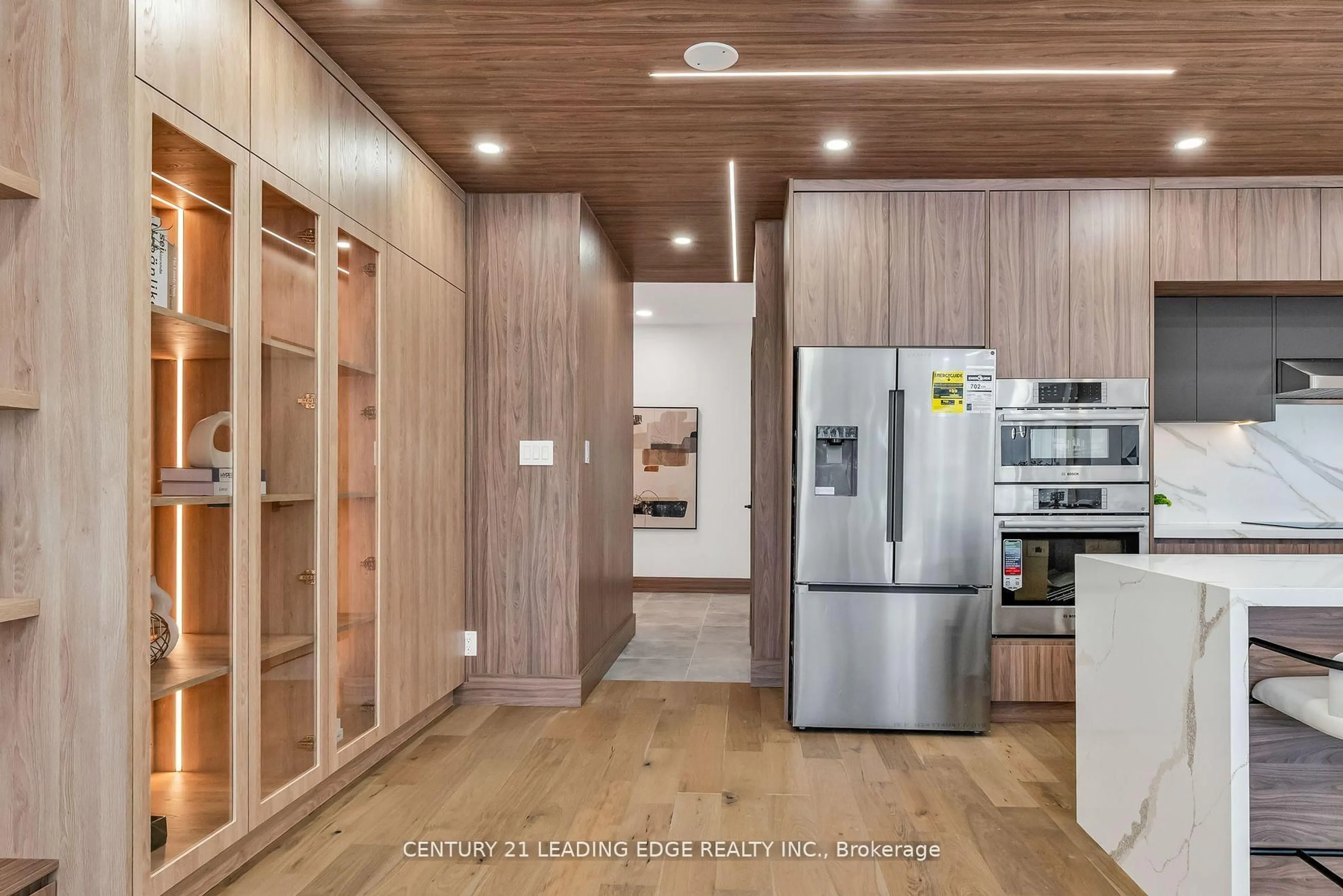 Open concept kitchen, wood/laminate floor for 1 Watergarden Way #208, Toronto Ontario M2K 2Z7