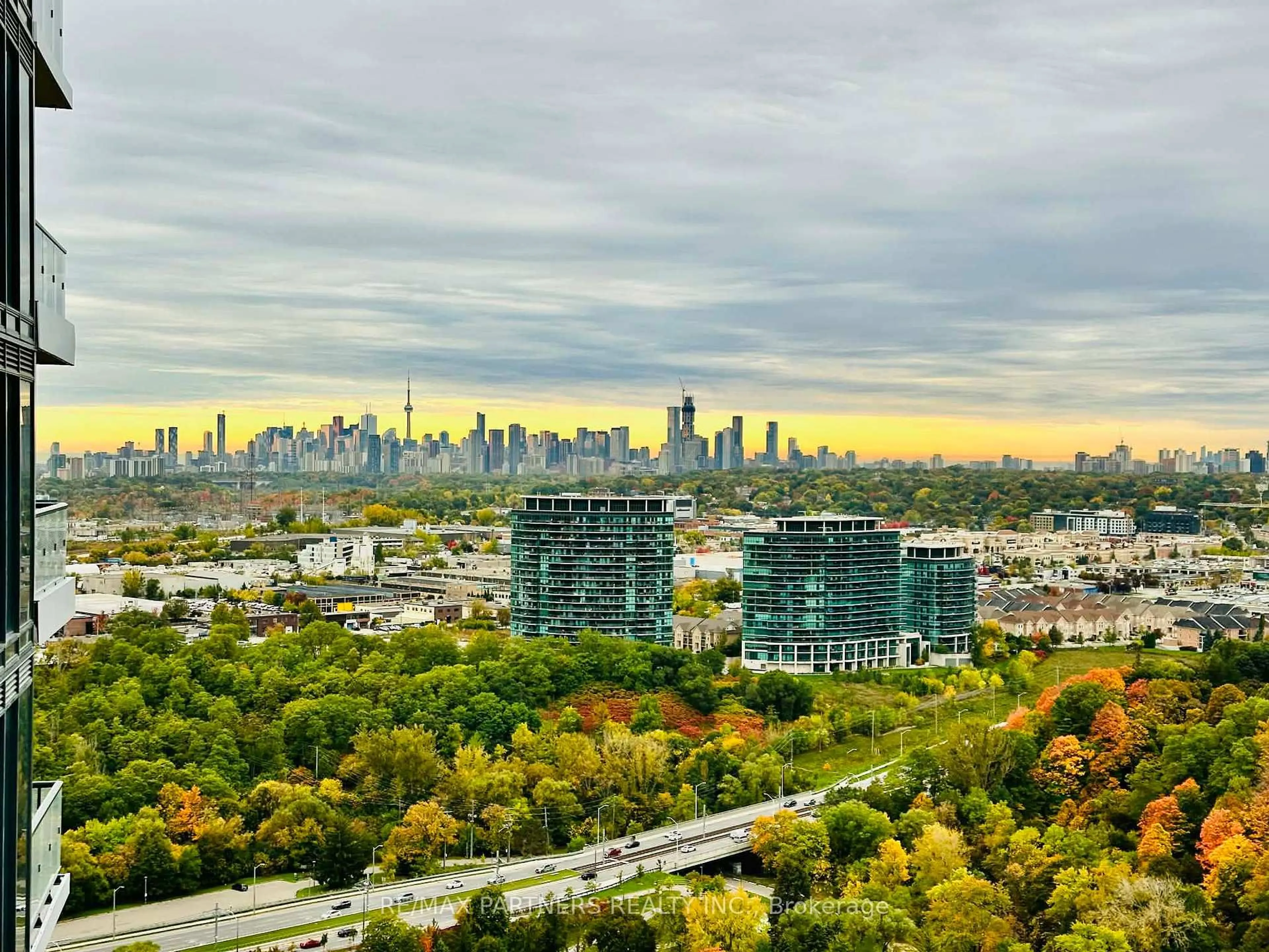 A pic from outside/outdoor area/front of a property/back of a property/a pic from drone, city buildings view from balcony for 10 Inn on the Park Dr #2603, Toronto Ontario M3C 0P9