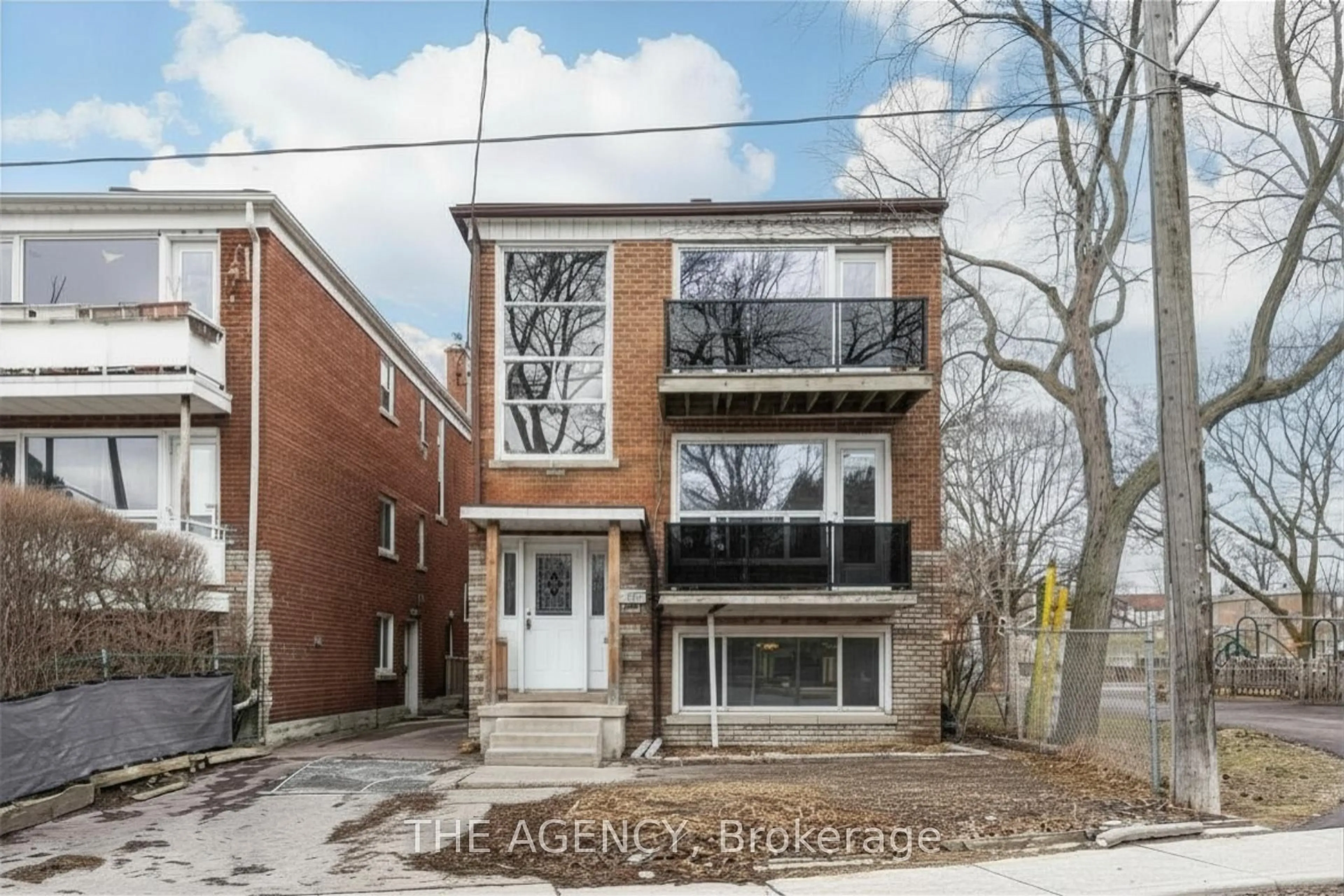 Home with brick exterior material, street for 374 Atlas Ave, Toronto Ontario M6C 3P9
