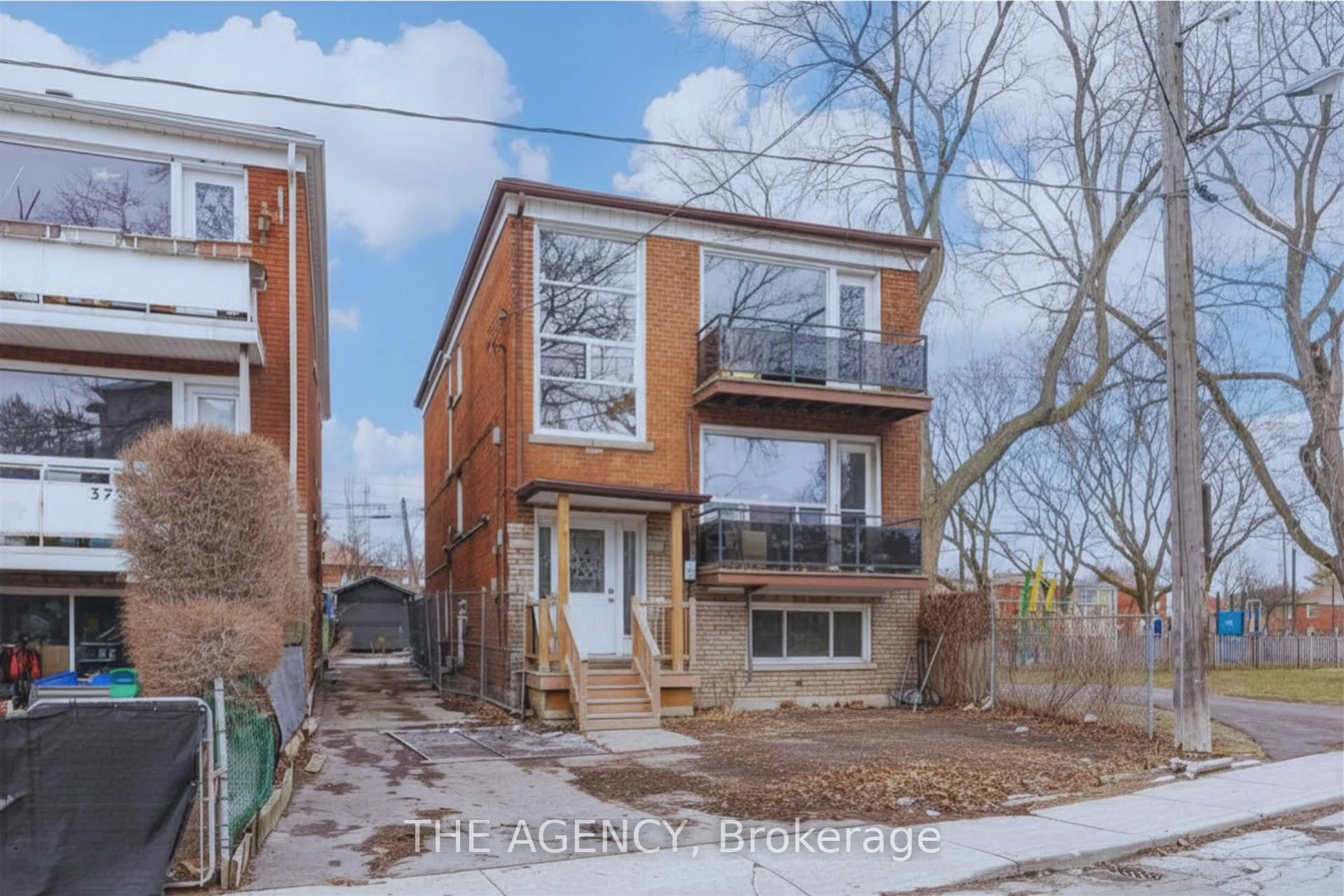 Home with brick exterior material, street for 374 Atlas Ave, Toronto Ontario M6C 3P9
