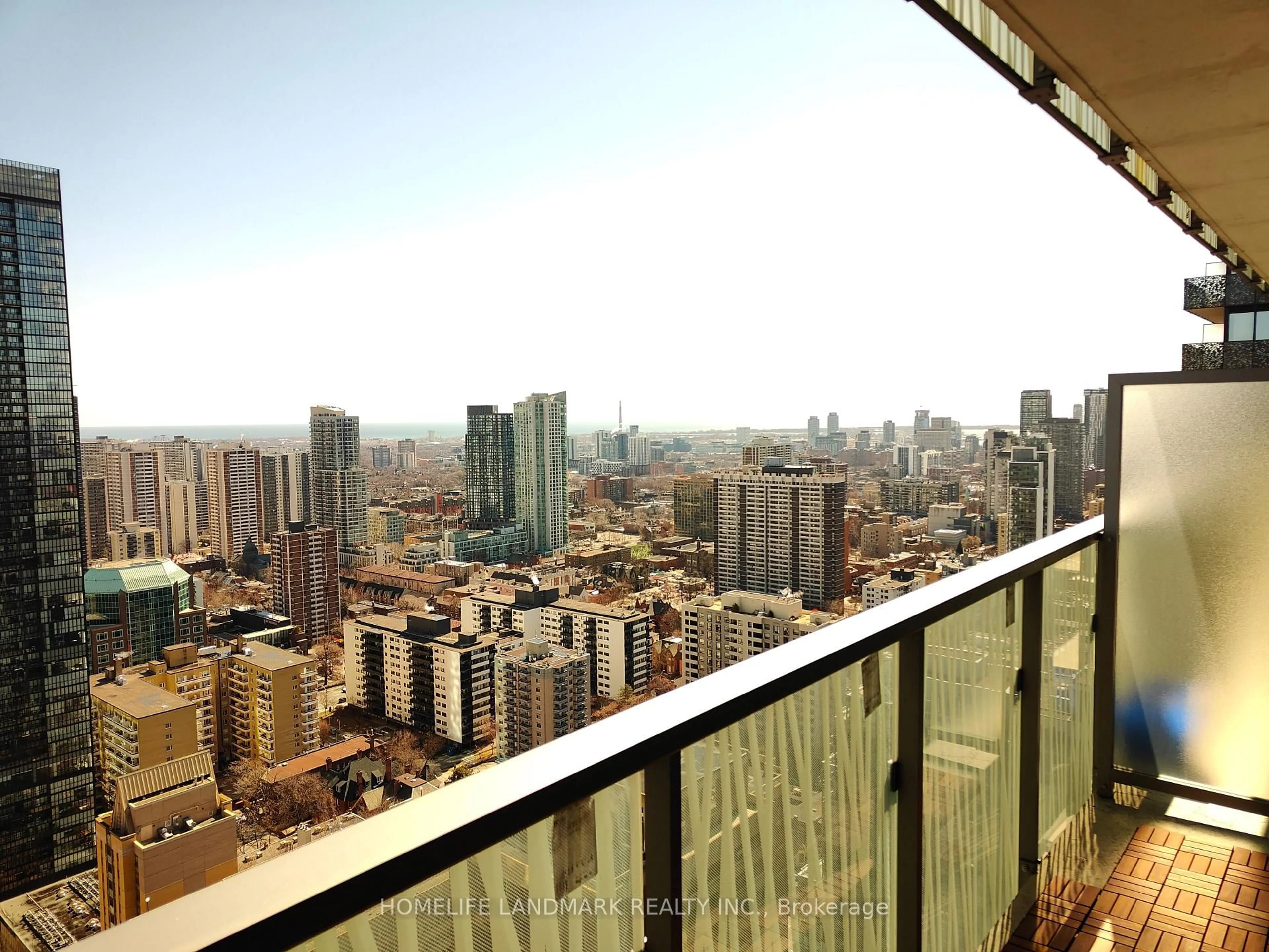 Balcony in the apartment, city buildings view from balcony for 50 Charles St #3402, Toronto Ontario M4Y 0C3