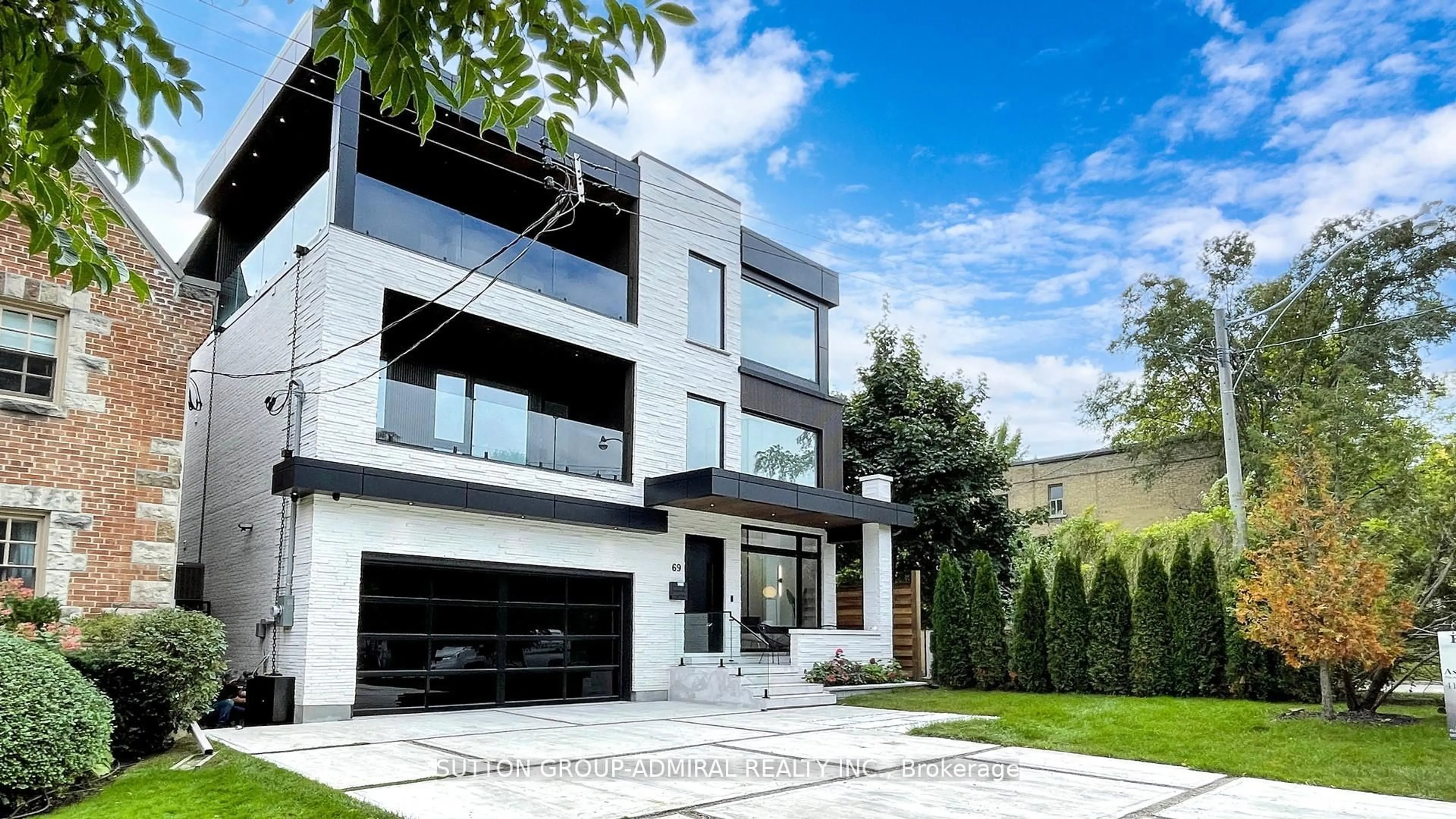 Home with brick exterior material, street for 69 Elderwood Dr, Toronto Ontario M5P 1X5