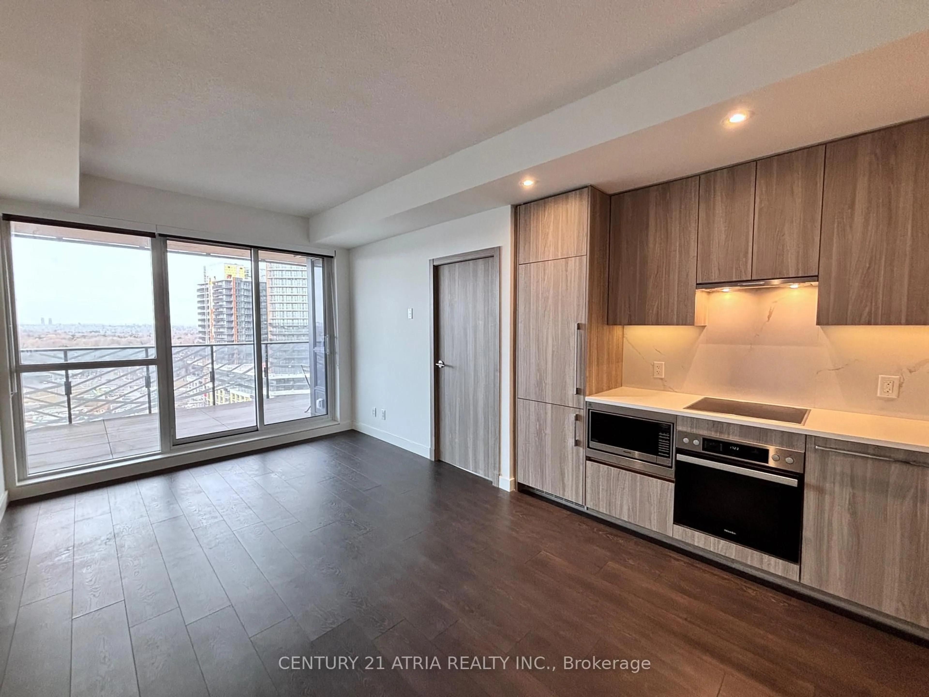 Open concept kitchen, wood/laminate floor for 27 Mcmahon Dr #1211, Toronto Ontario M2K 0J2