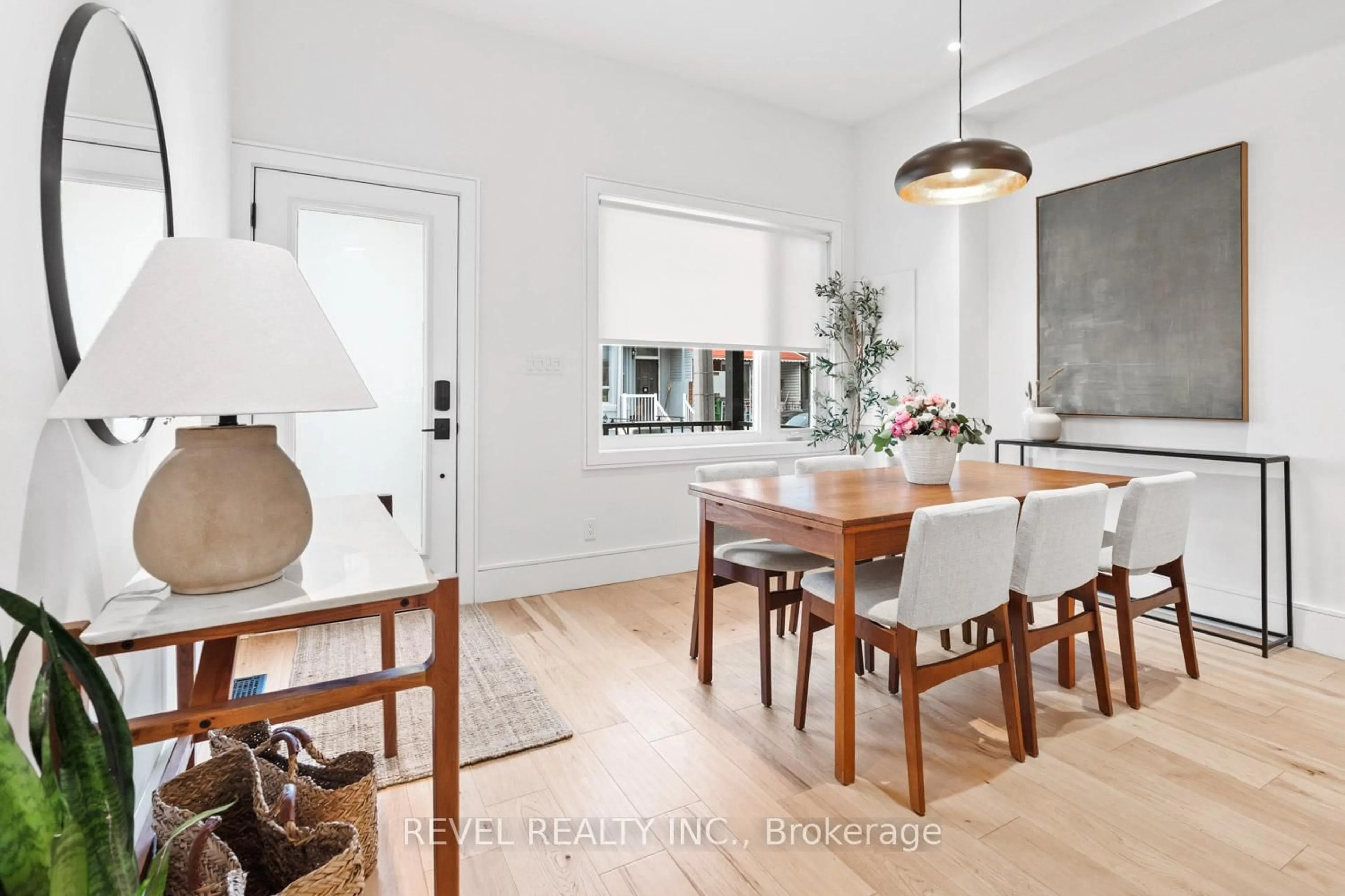 Dining room, wood/laminate floor for 23 Manning Ave, Toronto Ontario M6J 2K3