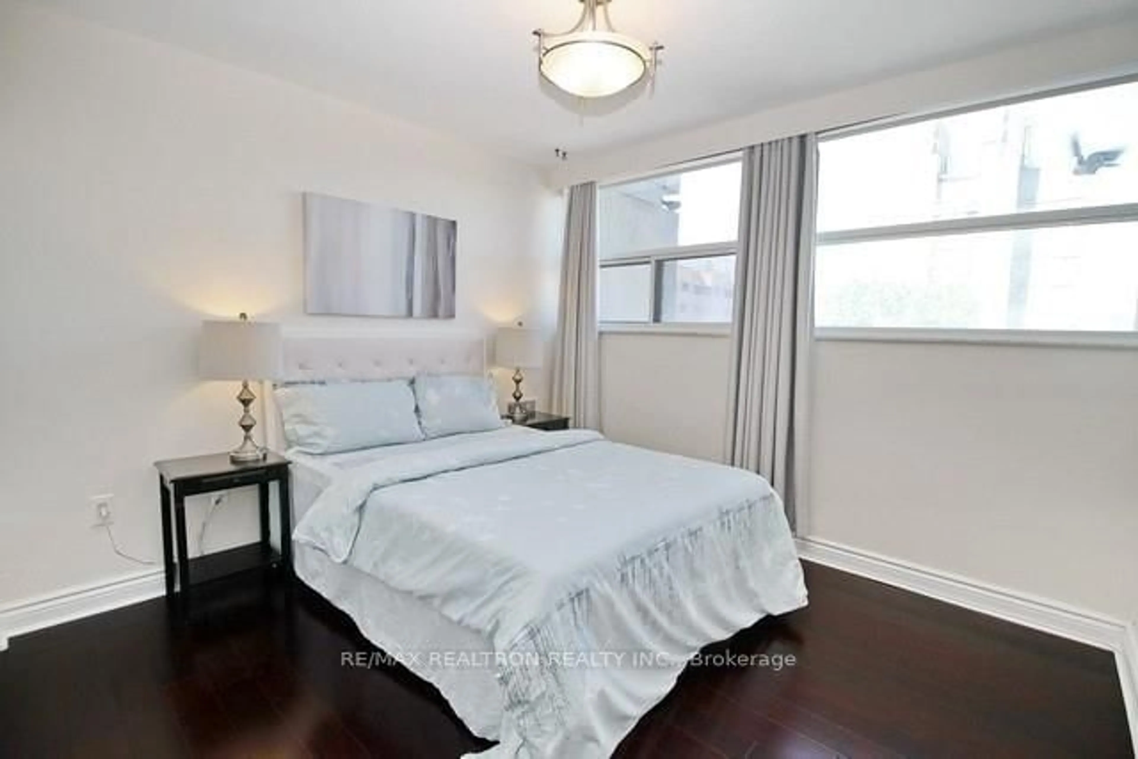 Bedroom with bed, wood/laminate floor for 3555 Bathurst St #602, Toronto Ontario M6A 2Y8