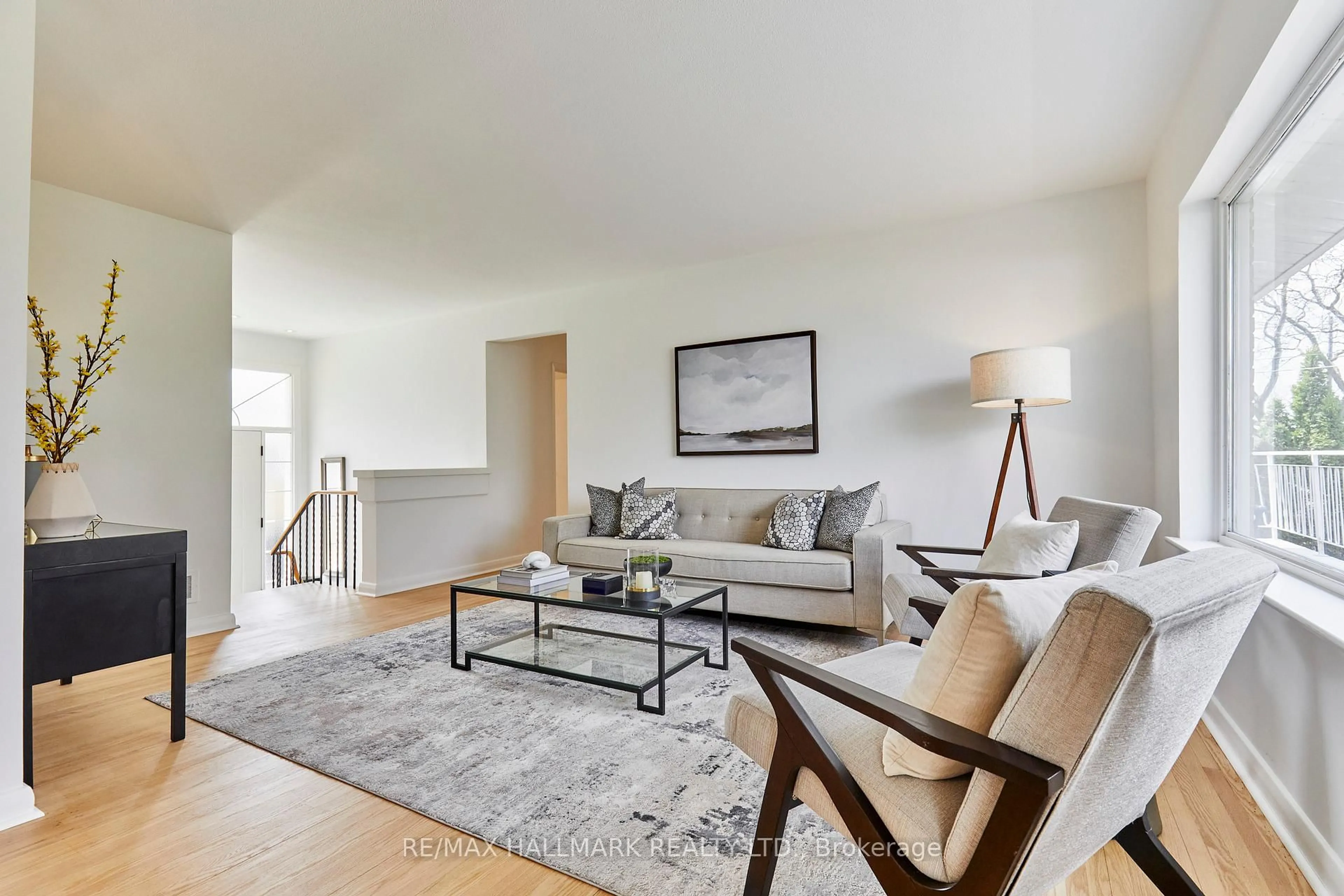 Living room with furniture, unknown for 194 Sloane Ave, Toronto Ontario M4A 2C6