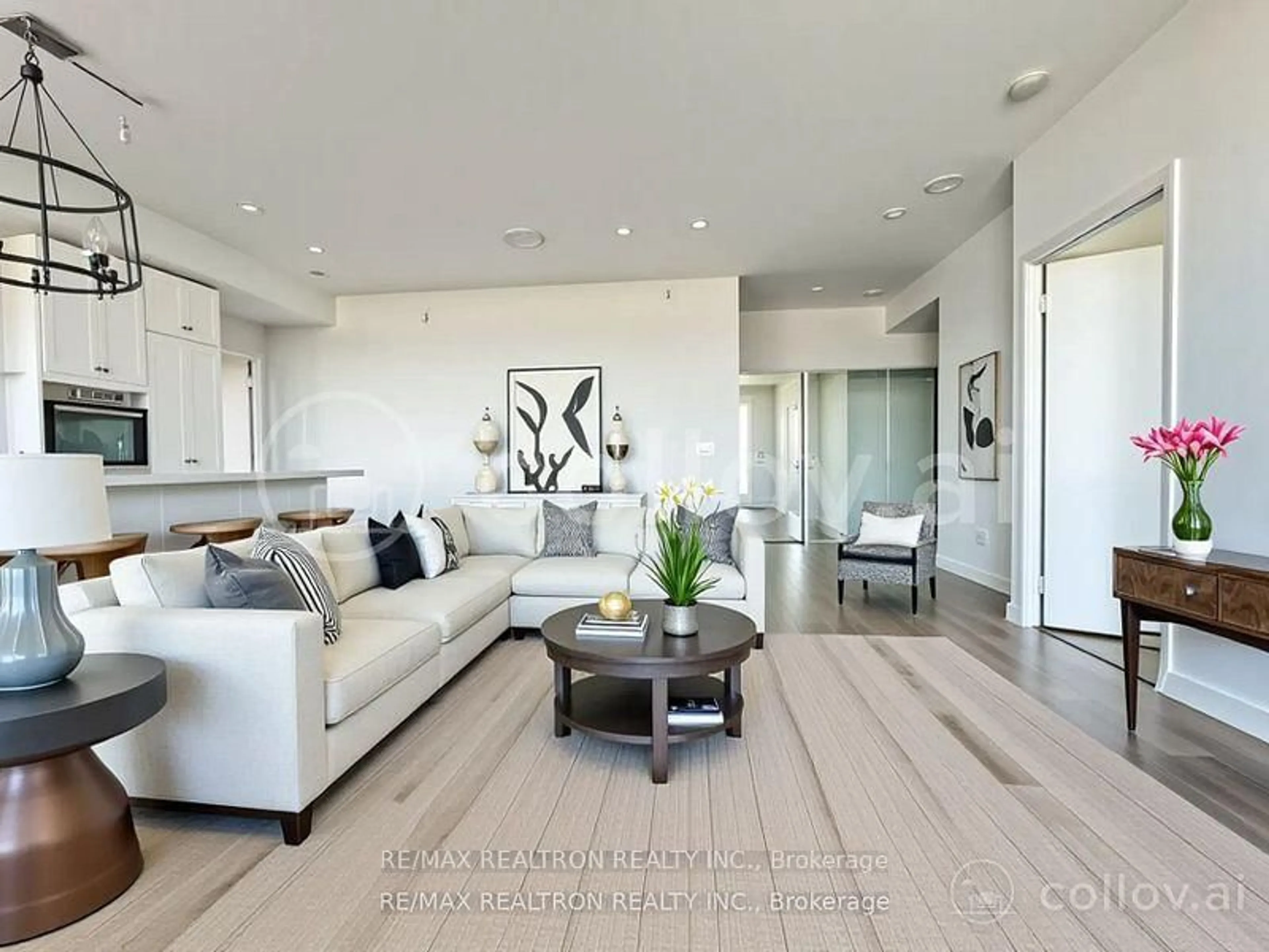 Living room with furniture, wood/laminate floor for 8 Eglinton Ave #5705, Toronto Ontario M4P 0C1