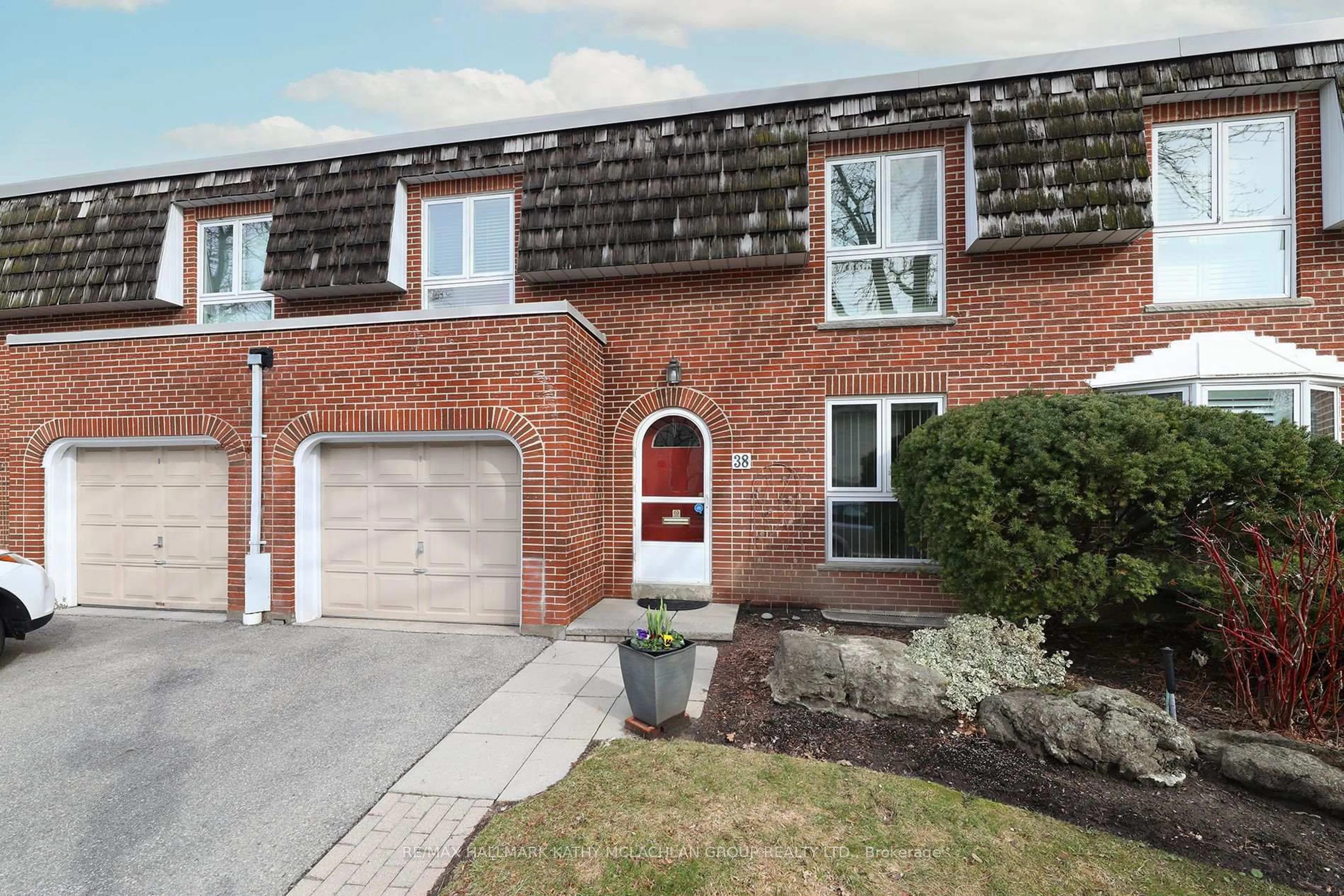 Home with brick exterior material, street for 38 Crimson Millway, Toronto Ontario M2L 1T6