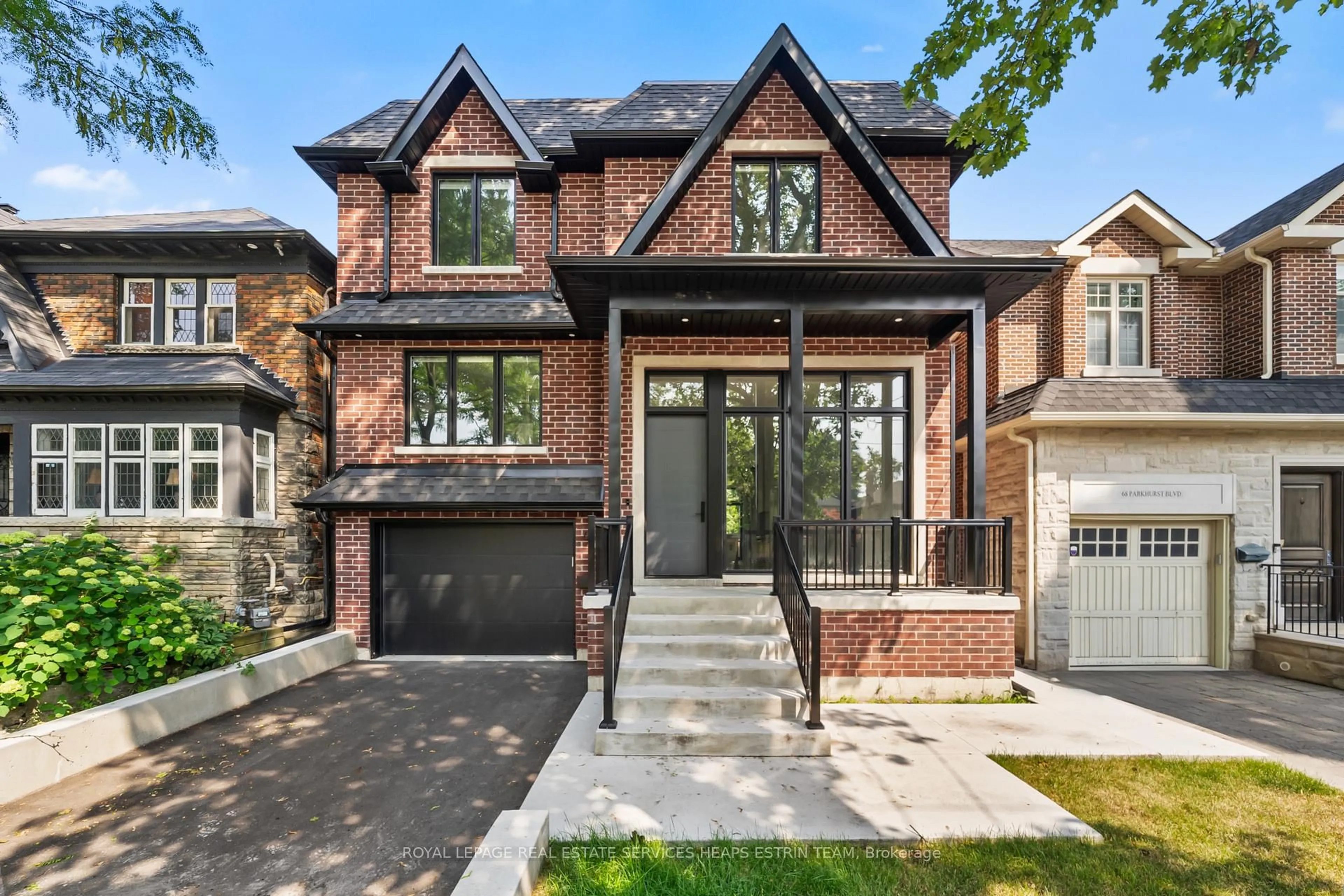 Home with brick exterior material, street for 66 Parkhurst Blvd, Toronto Ontario M4G 2E2