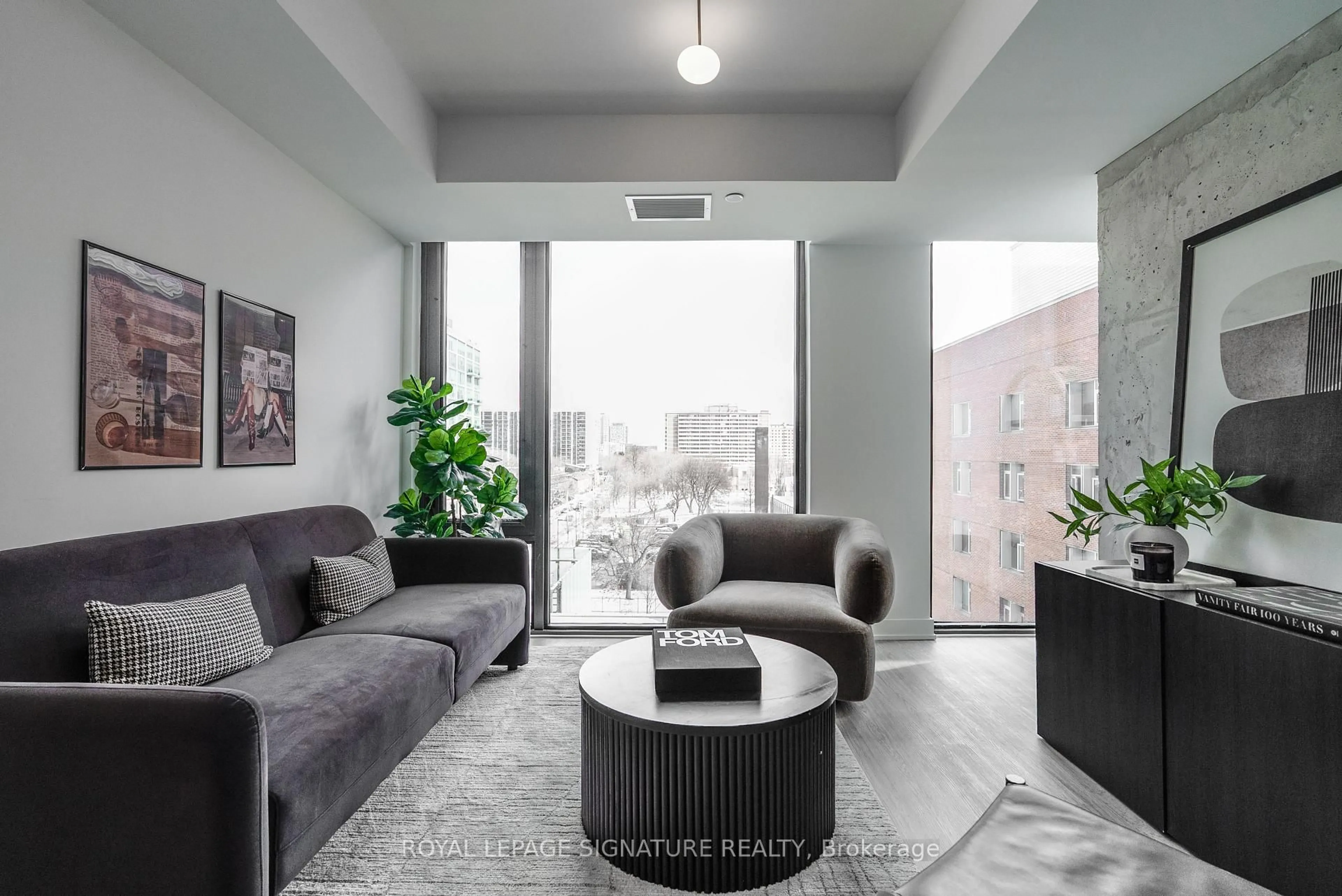 Living room with furniture, cement floor for 47 Mutual St #605, Toronto Ontario M5B 0C6