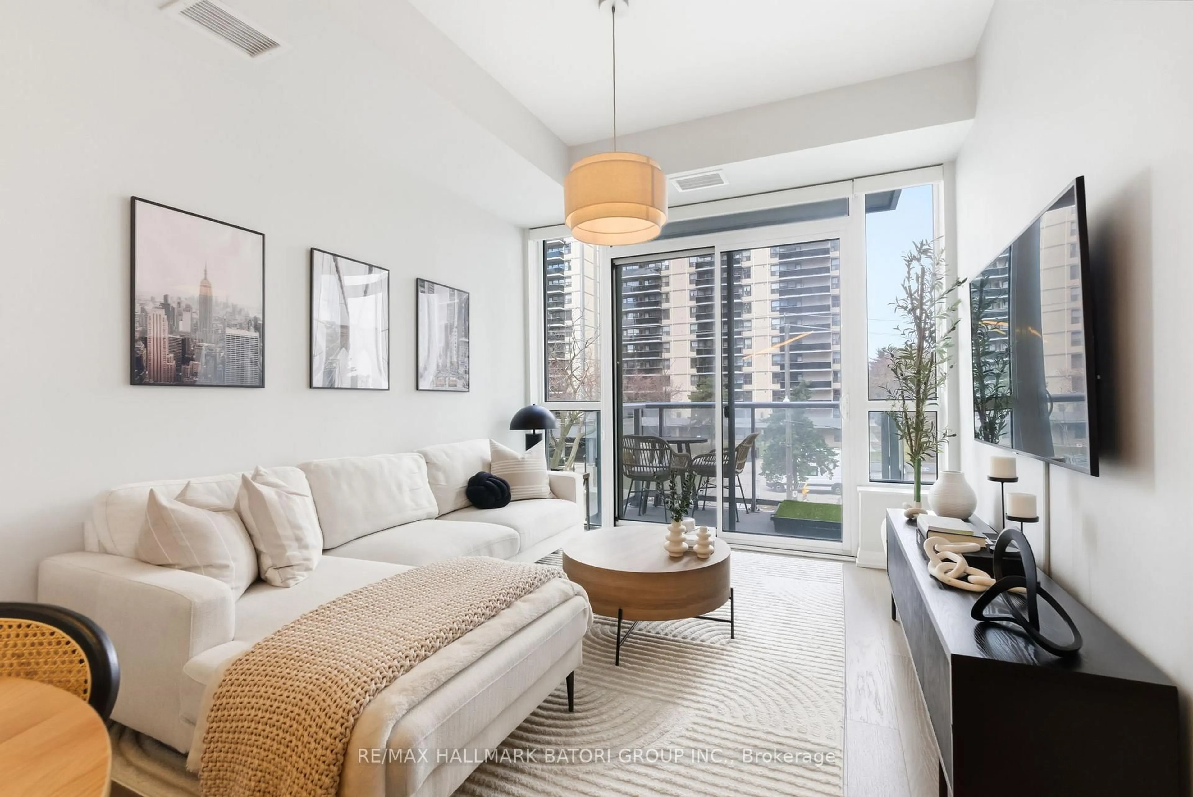 Living room with furniture, unknown for 101 Erskine Ave #217, Toronto Ontario M4P 1Y5