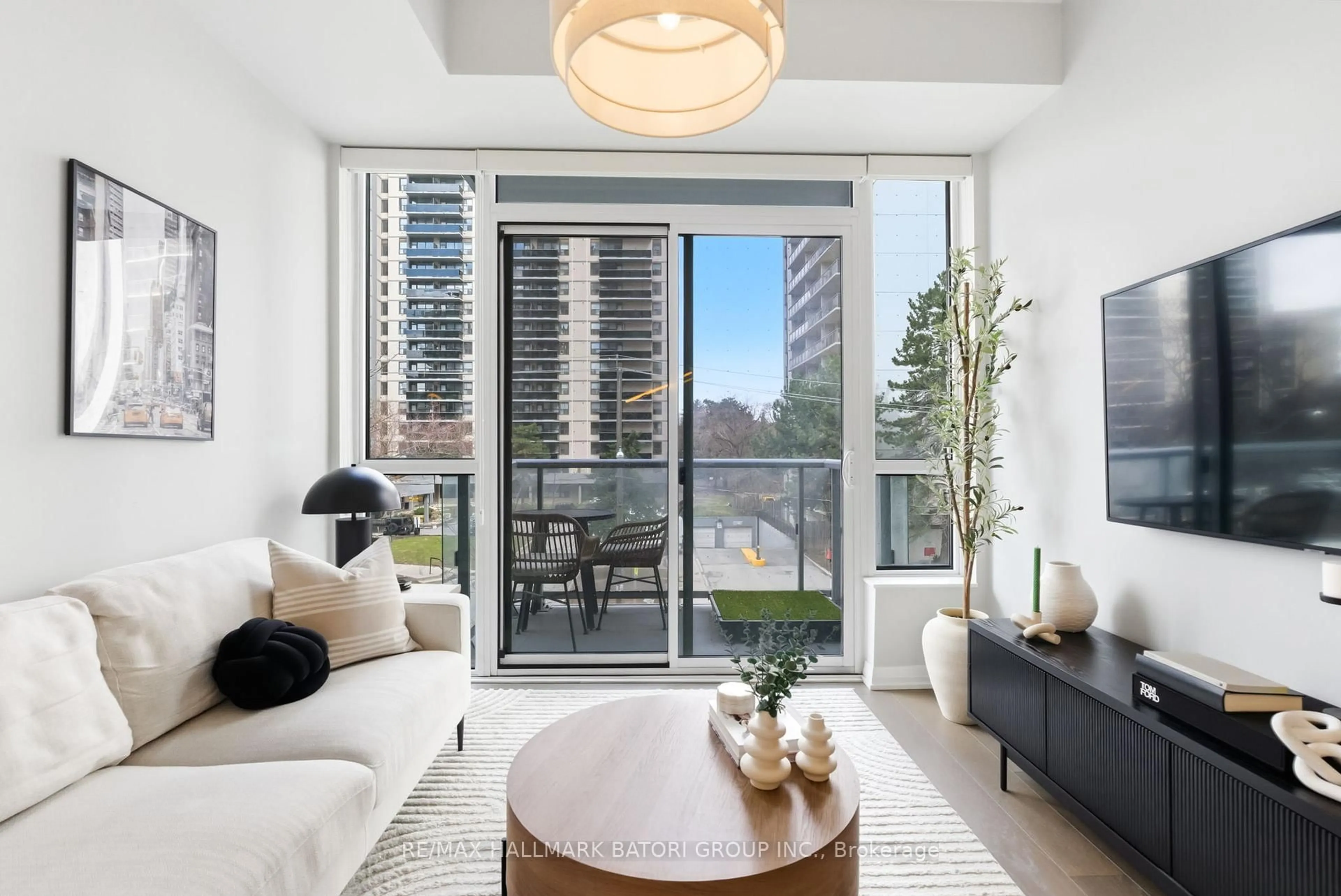 Living room with furniture, unknown for 101 Erskine Ave #217, Toronto Ontario M4P 1Y5