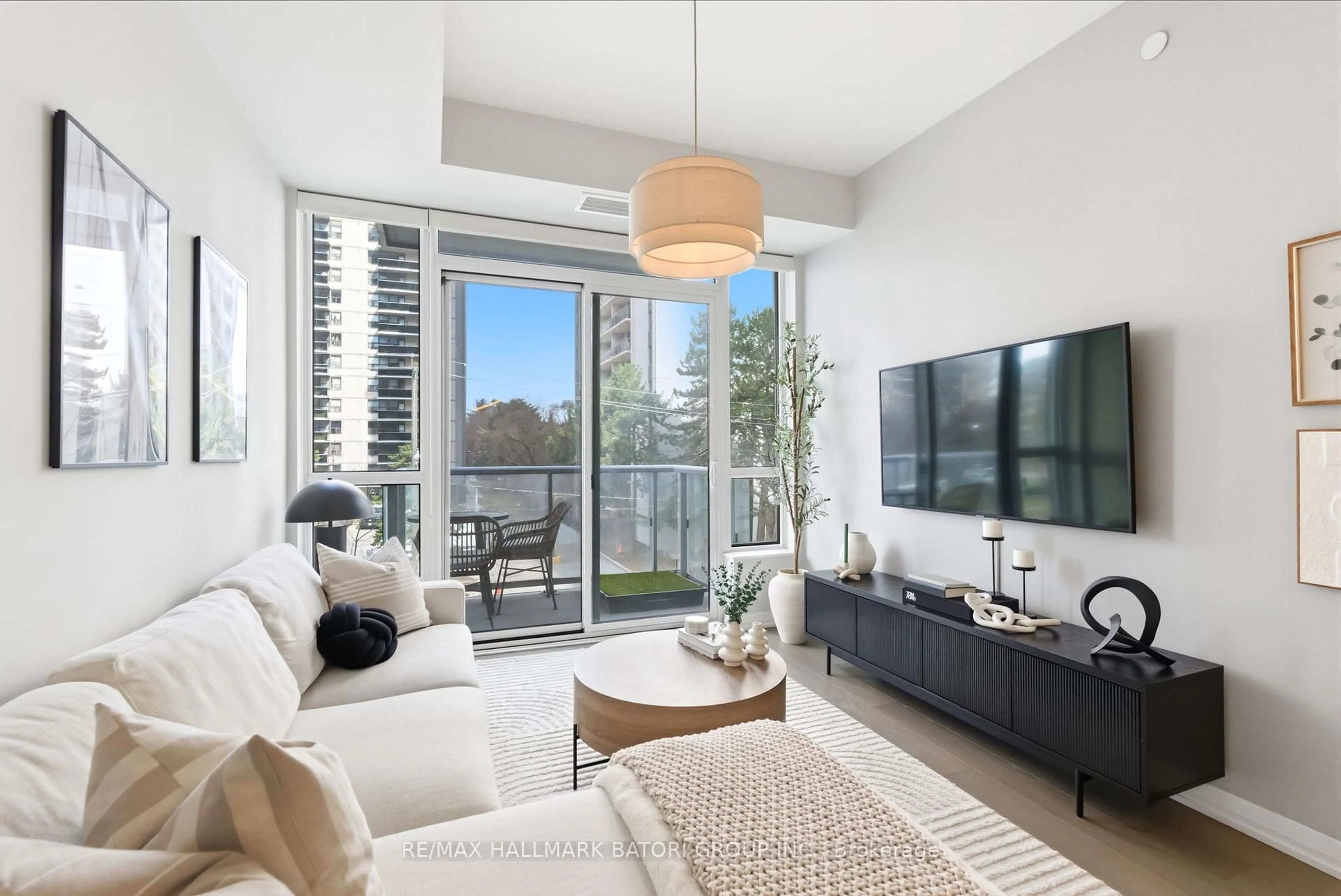 Living room with furniture, unknown for 101 Erskine Ave #217, Toronto Ontario M4P 1Y5