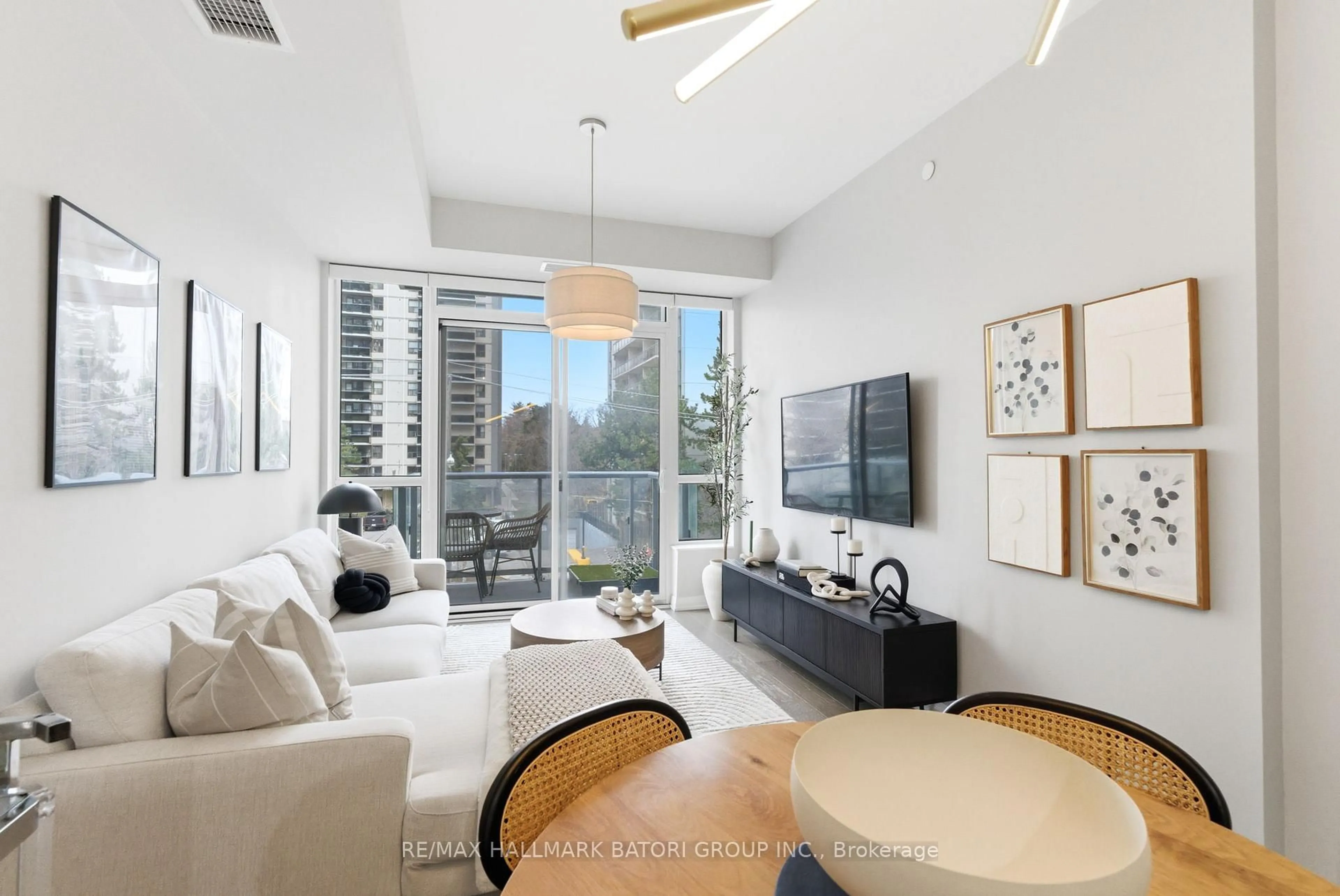 Living room with furniture, unknown for 101 Erskine Ave #217, Toronto Ontario M4P 1Y5