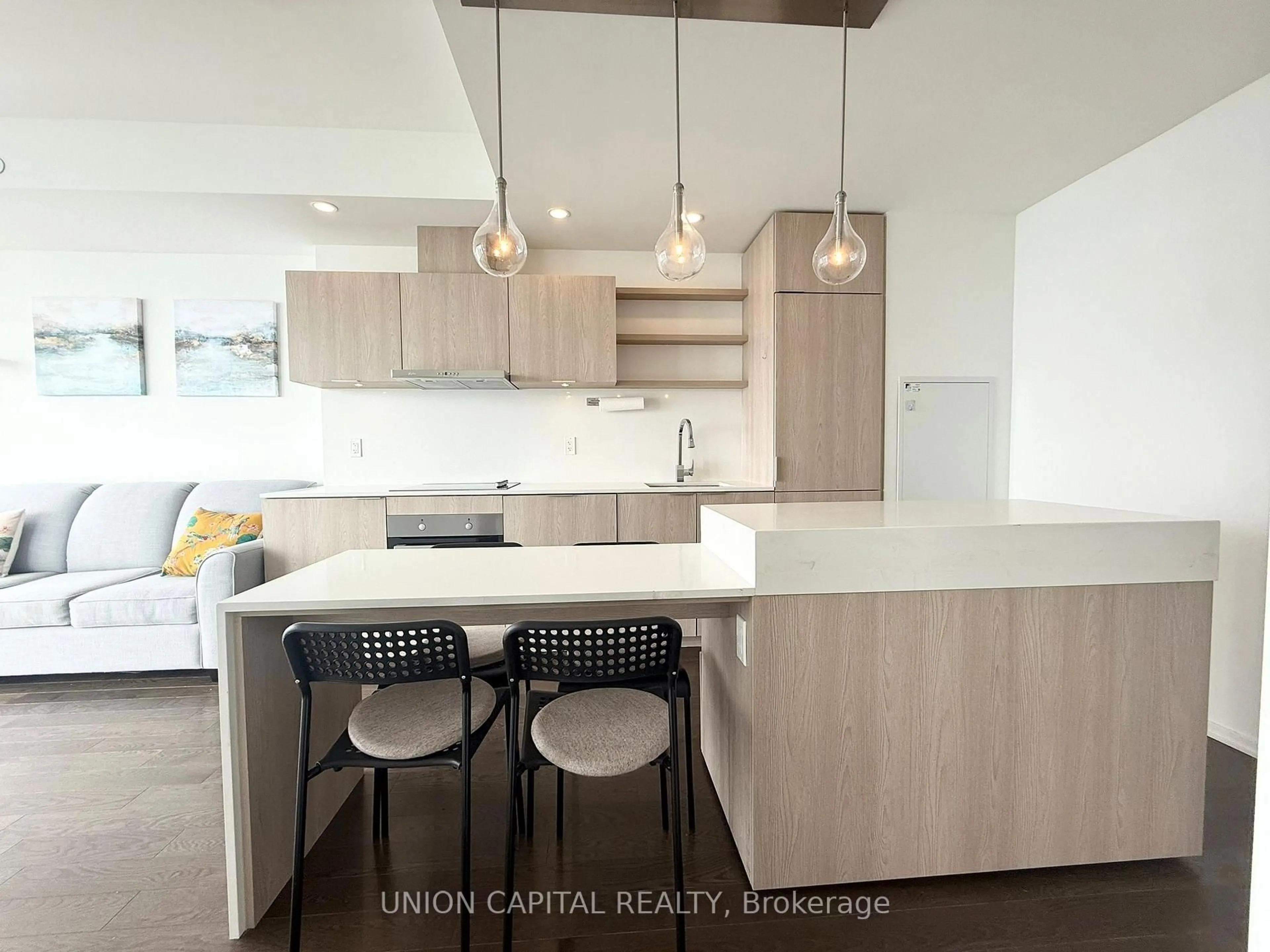Open concept kitchen, wood/laminate floor for 16 Bonnycastle St #3910, Toronto Ontario M5A 0C9