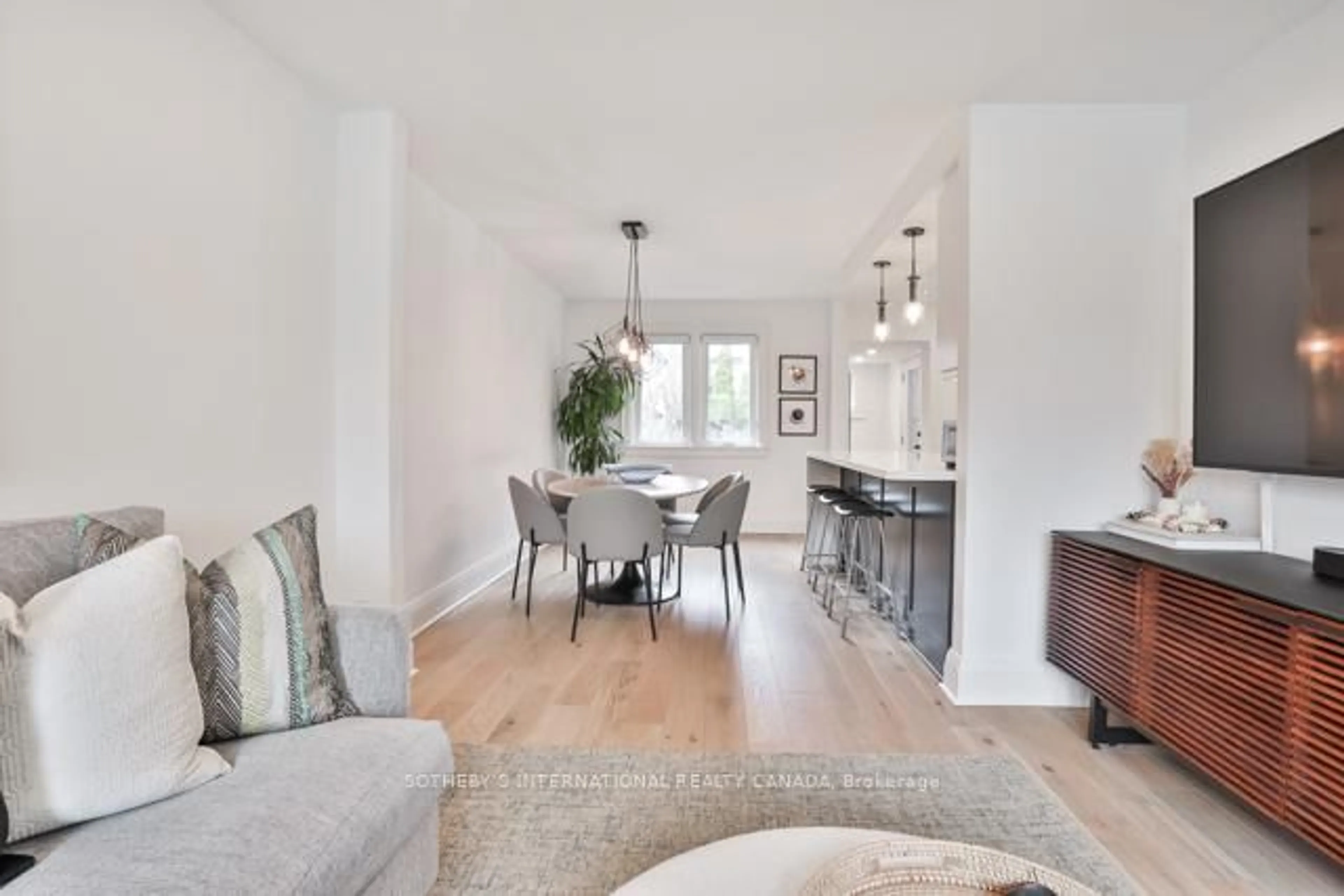 Open concept kitchen, wood/laminate floor for 64 Robina Ave, Toronto Ontario M6C 3Y7