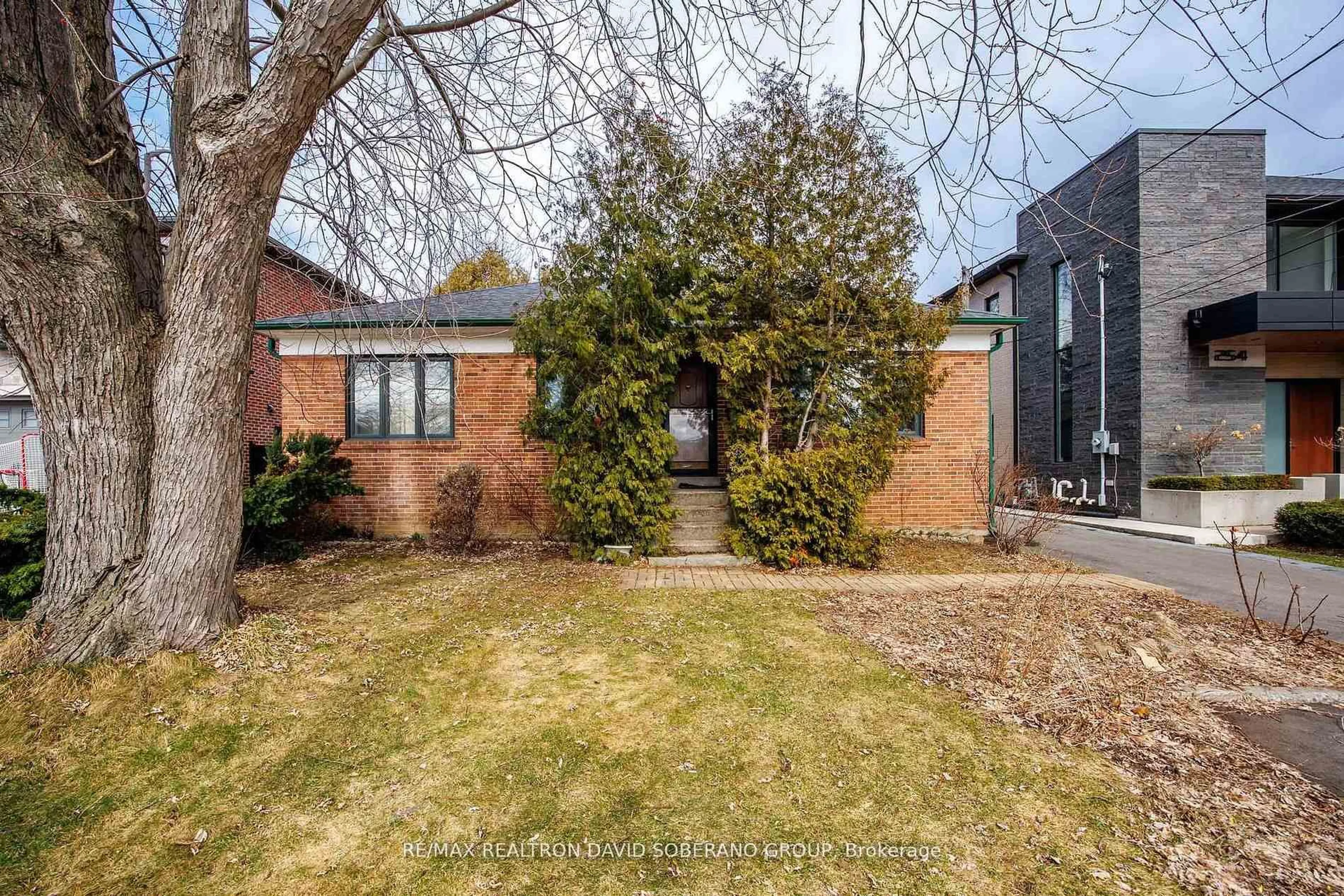 Home with brick exterior material, street for 256 Codsell Ave, Toronto Ontario M3H 3X1