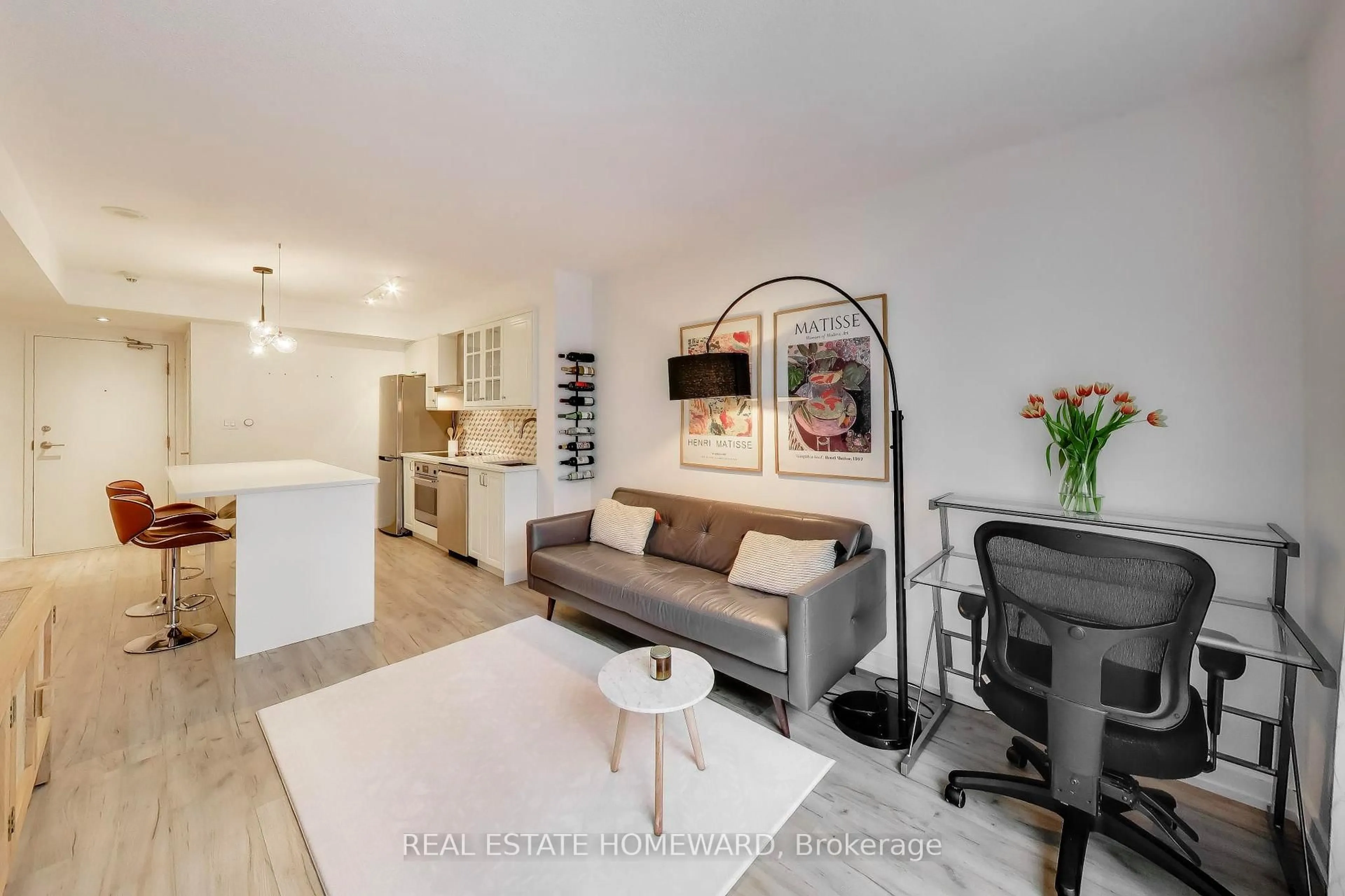 Living room with furniture, wood/laminate floor for 15 Brunel Crt #505, Toronto Ontario M5V 3Y6