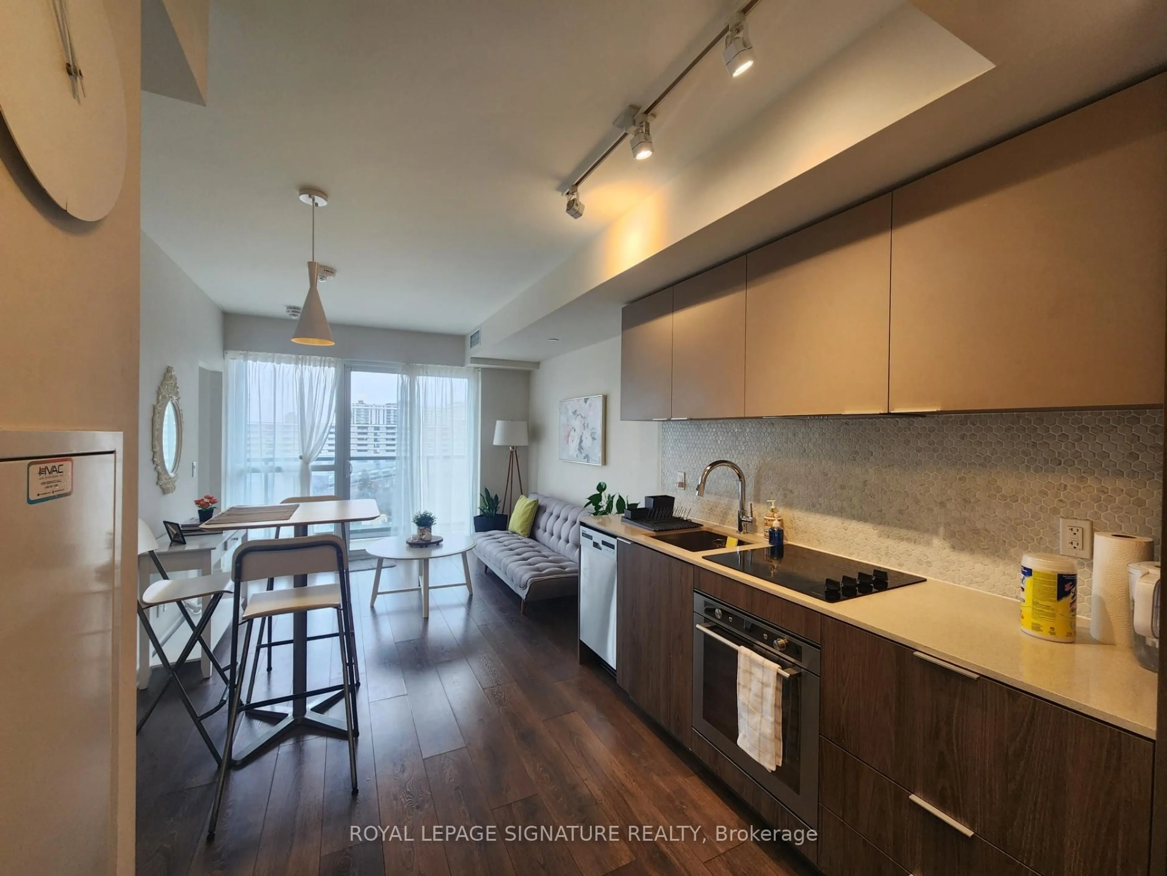 Open concept kitchen, wood/laminate floor for 2 Sonic Way #808, Toronto Ontario M3C 0P2