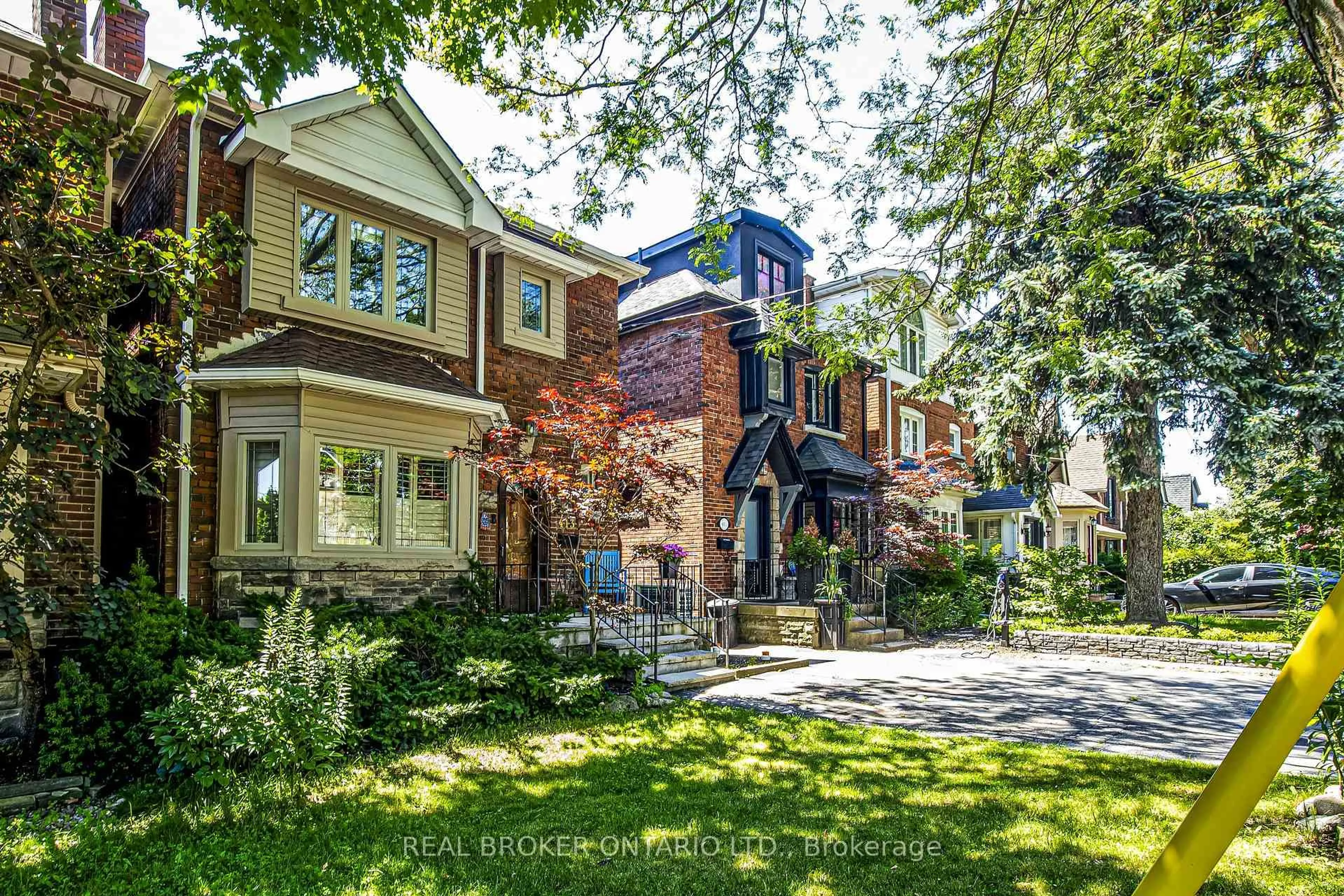 Home with brick exterior material, street for 413 Roselawn Ave, Toronto Ontario M5N 1J9