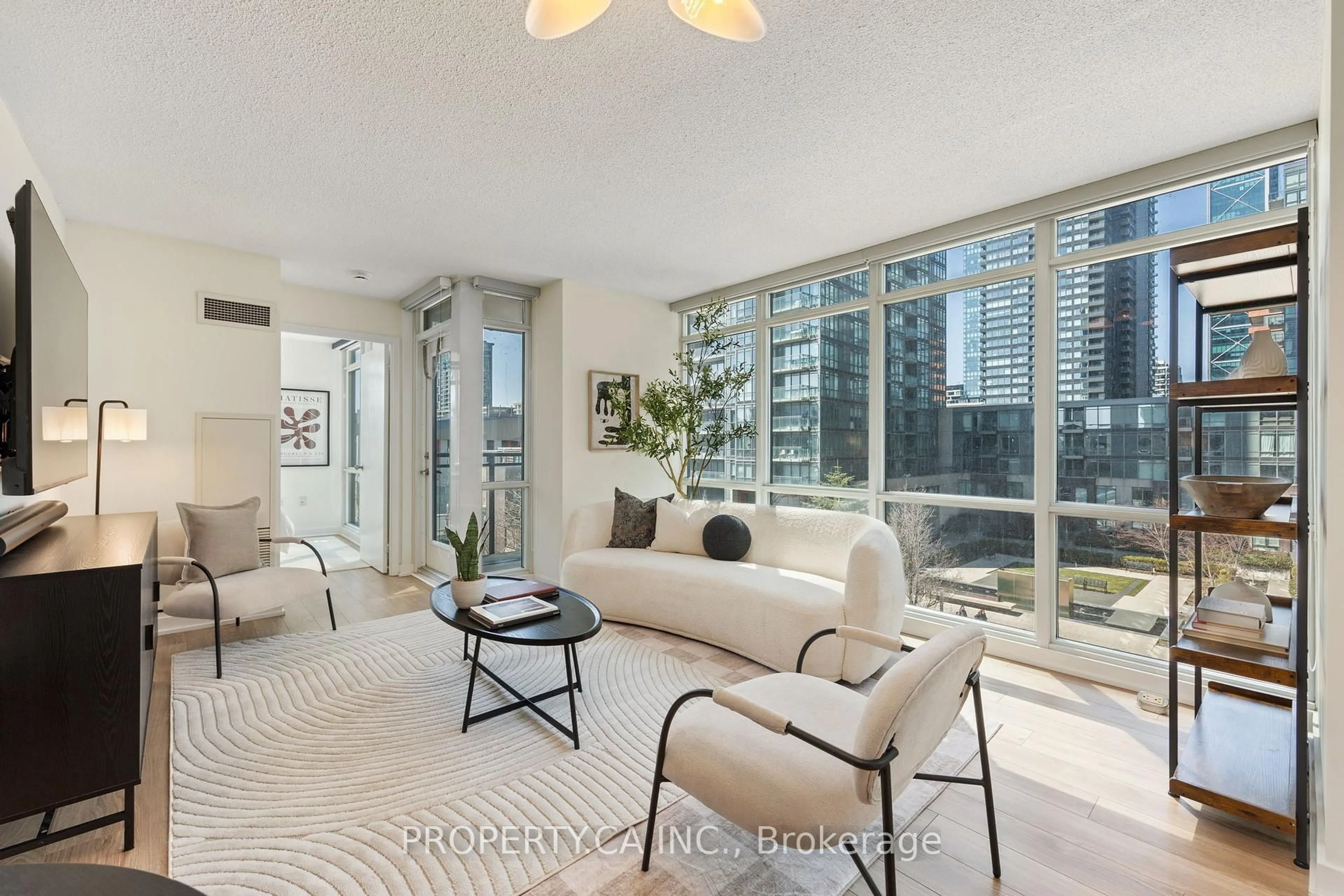 Living room with furniture, unknown for 11 Brunel Crt #503, Toronto Ontario M5V 3Y3